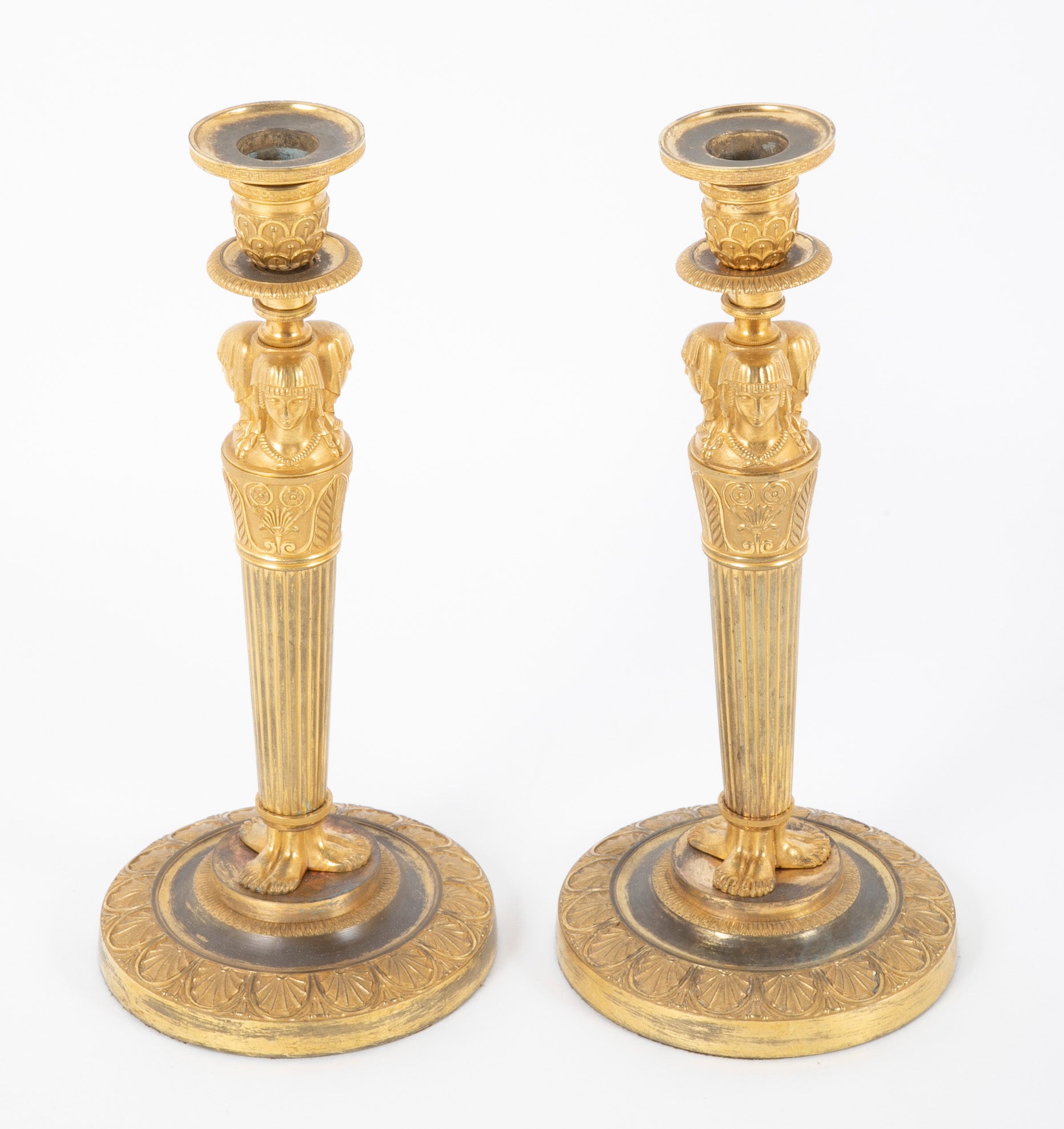 Pair of French Consulat Ormolu Candlesticks