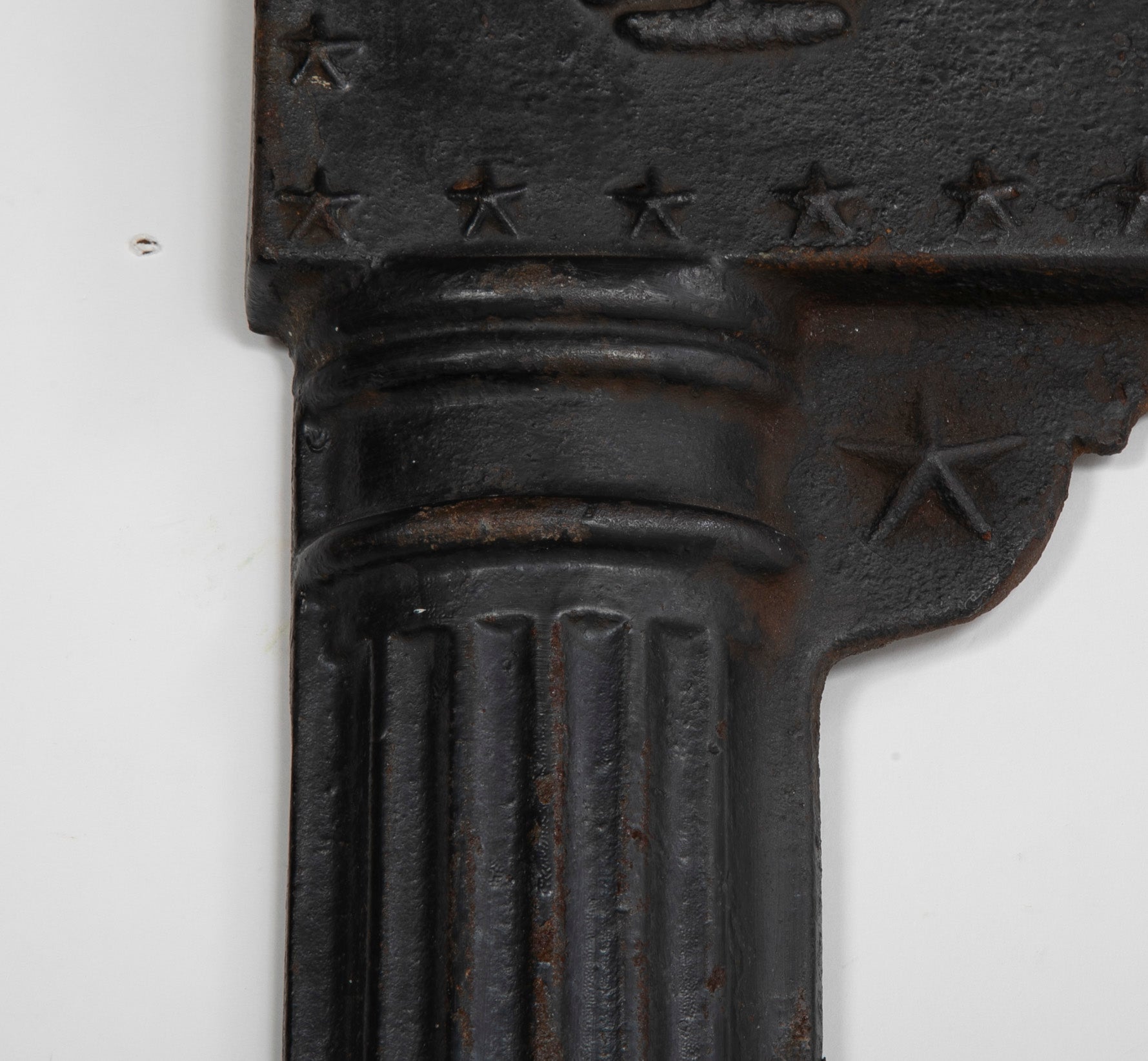 A Piece of an American Cast Iron Stove with Eagle, Wisdom Lamps & Evergreens