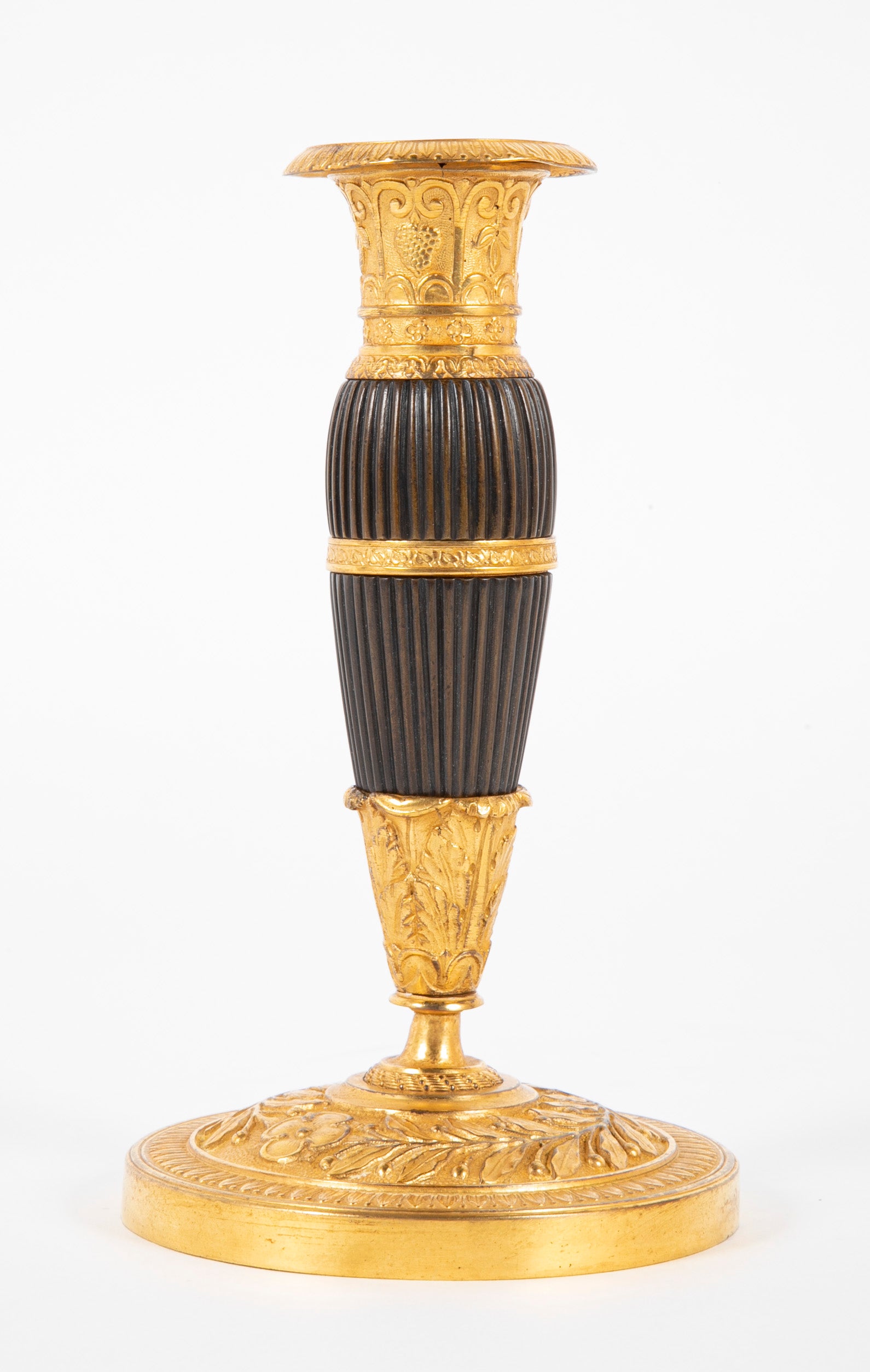 A Pair of Early 19th century French Gilt & Patinated Bronze Candlesticks