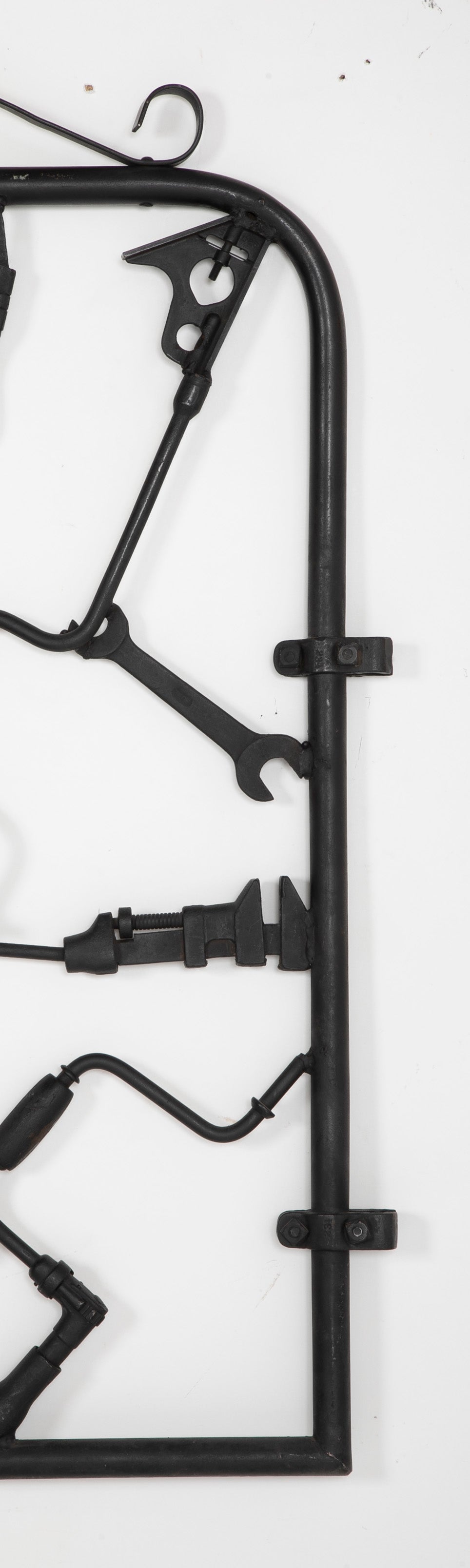 A Garden Gate in Wrought Iron with Antique Farm Tools by Rodney Rosebrook