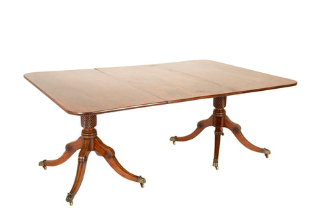 A Two Pedestal English Regency Mahogany Dining table