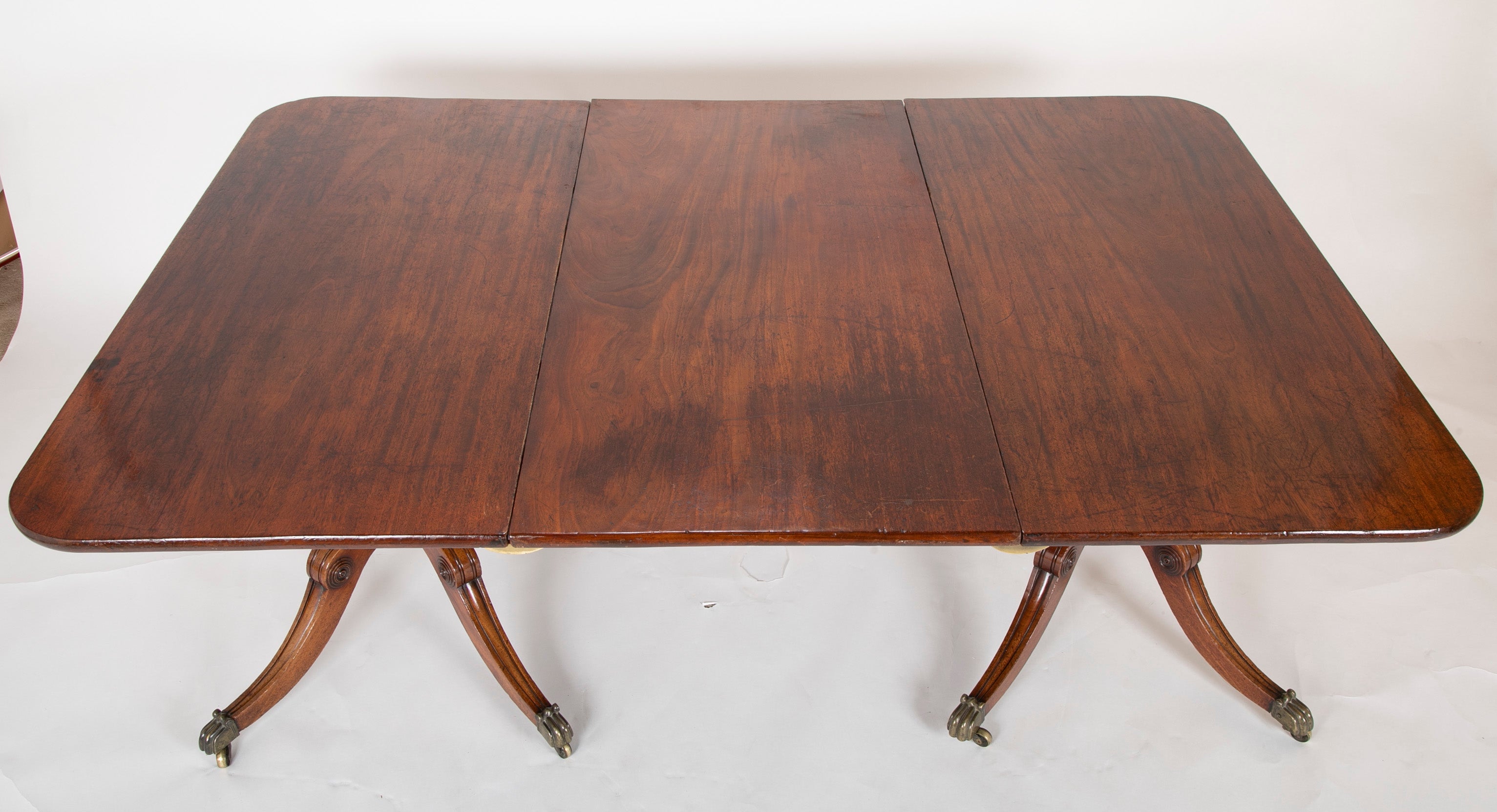 A Two Pedestal English Regency Mahogany Dining table
