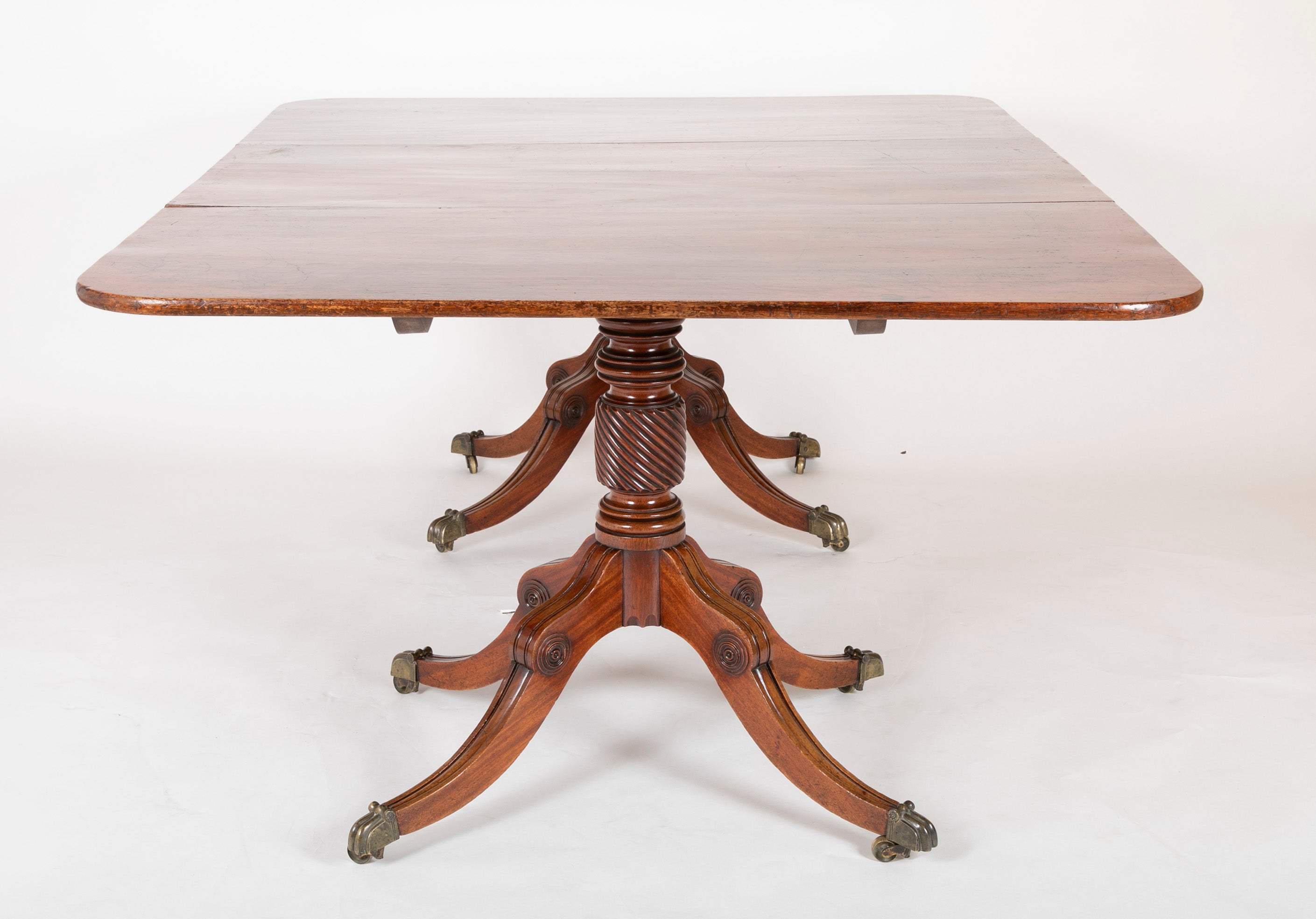 A Two Pedestal English Regency Mahogany Dining table