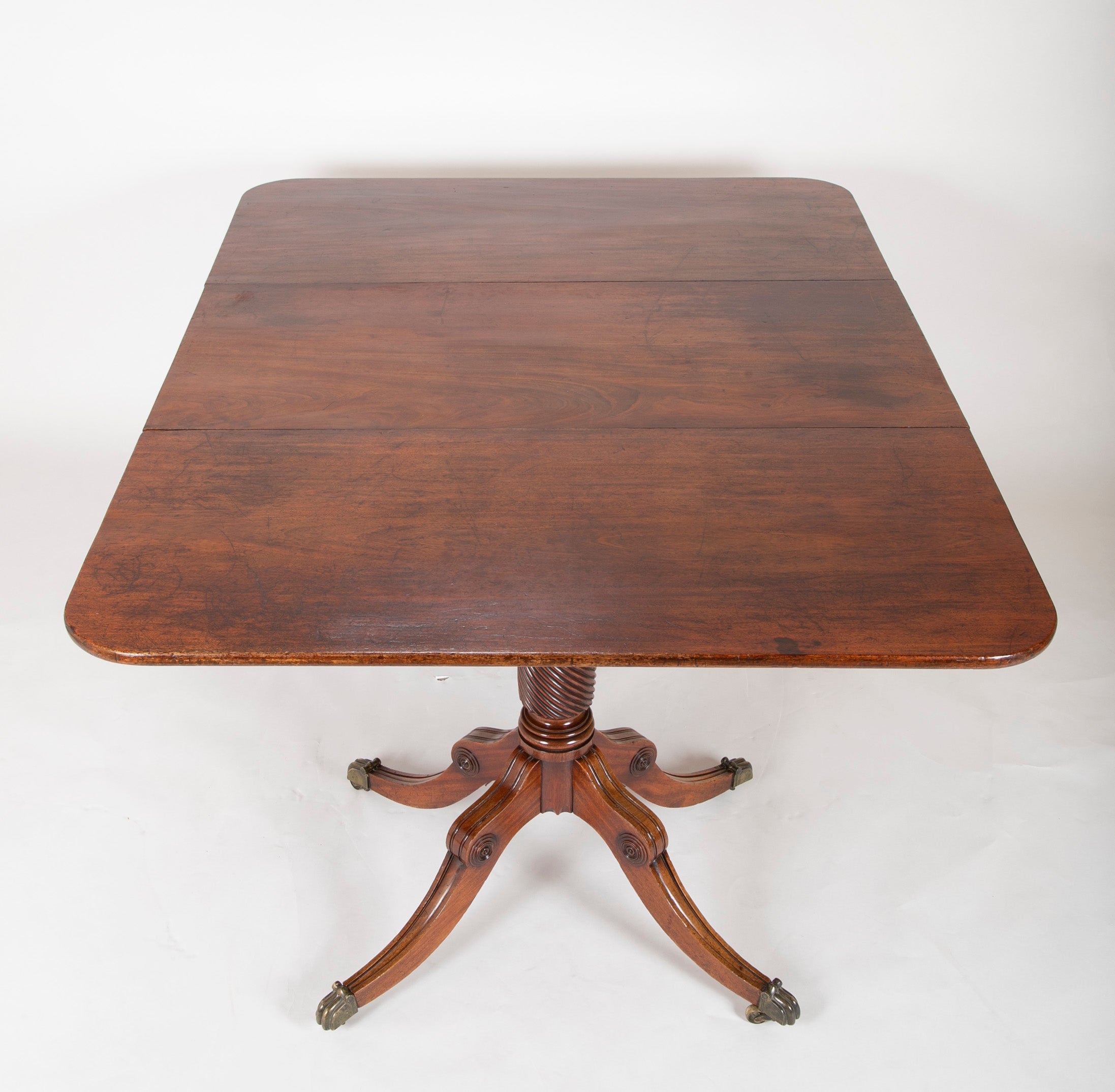 A Two Pedestal English Regency Mahogany Dining table