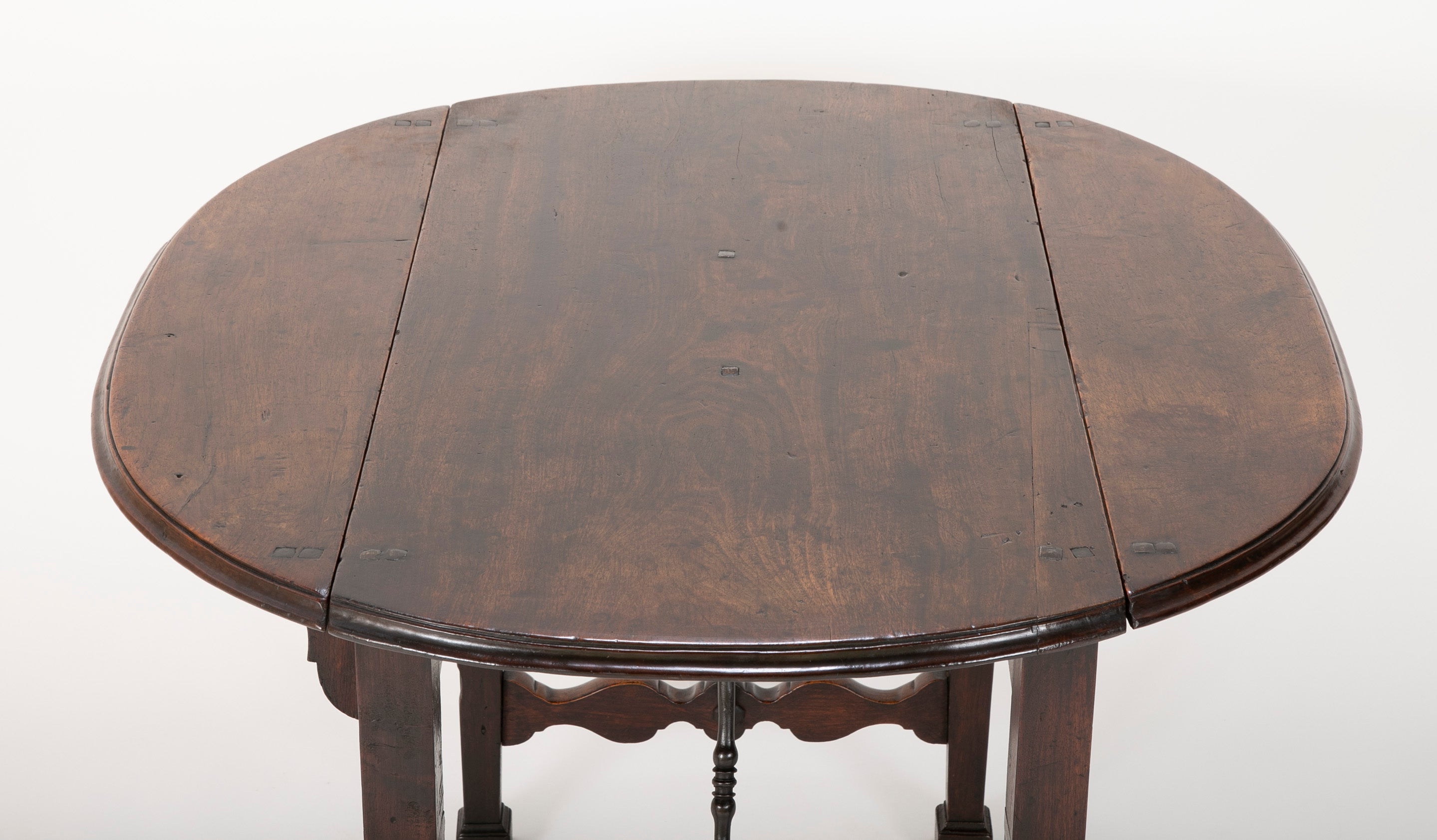 Spanish Baroque Walnut Drop Leaf Table with Wrought Iron Stretchers