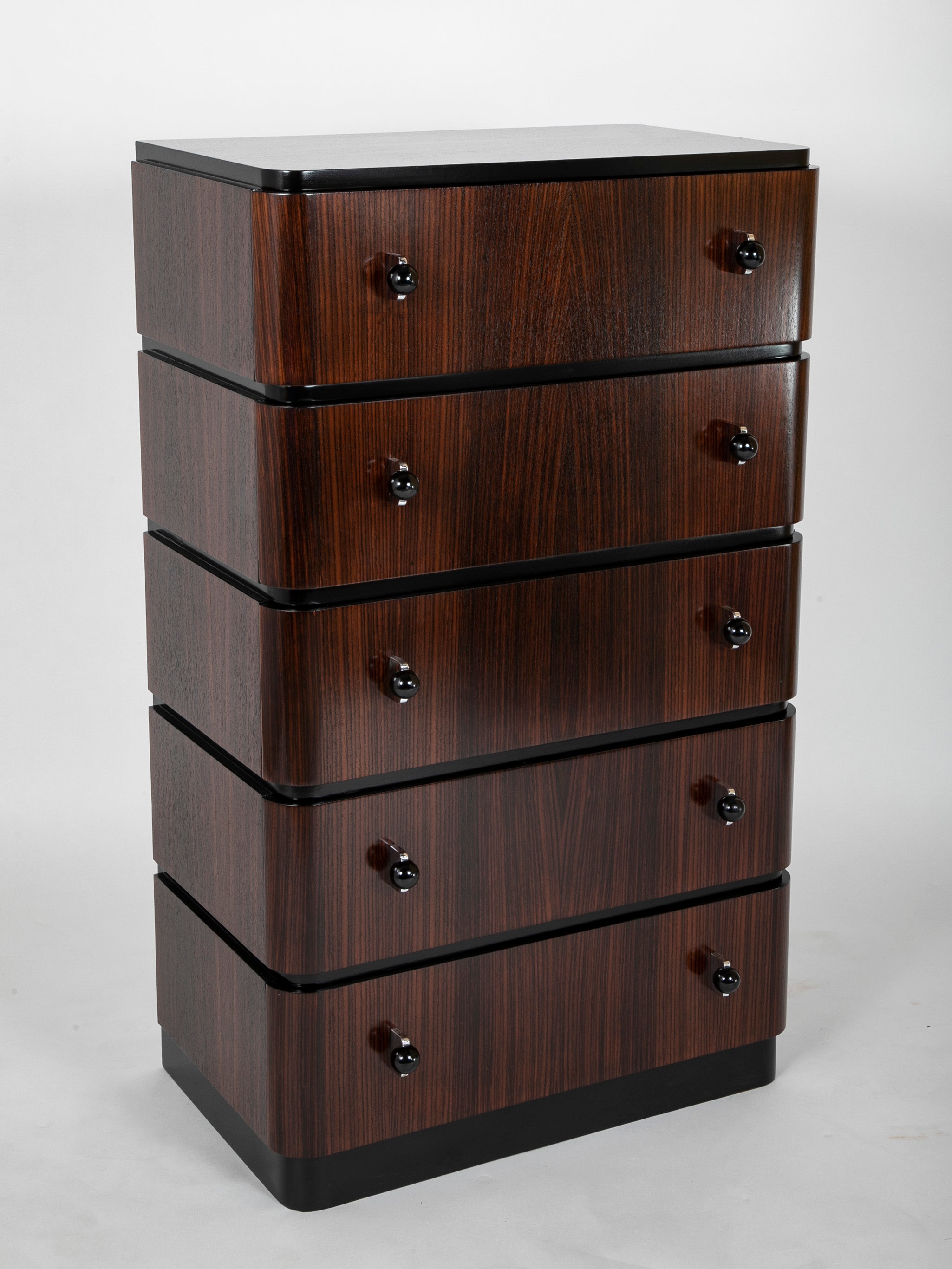 A Striking Pair of Indian Rosewood Chests of Drawers by Donald Deskey
