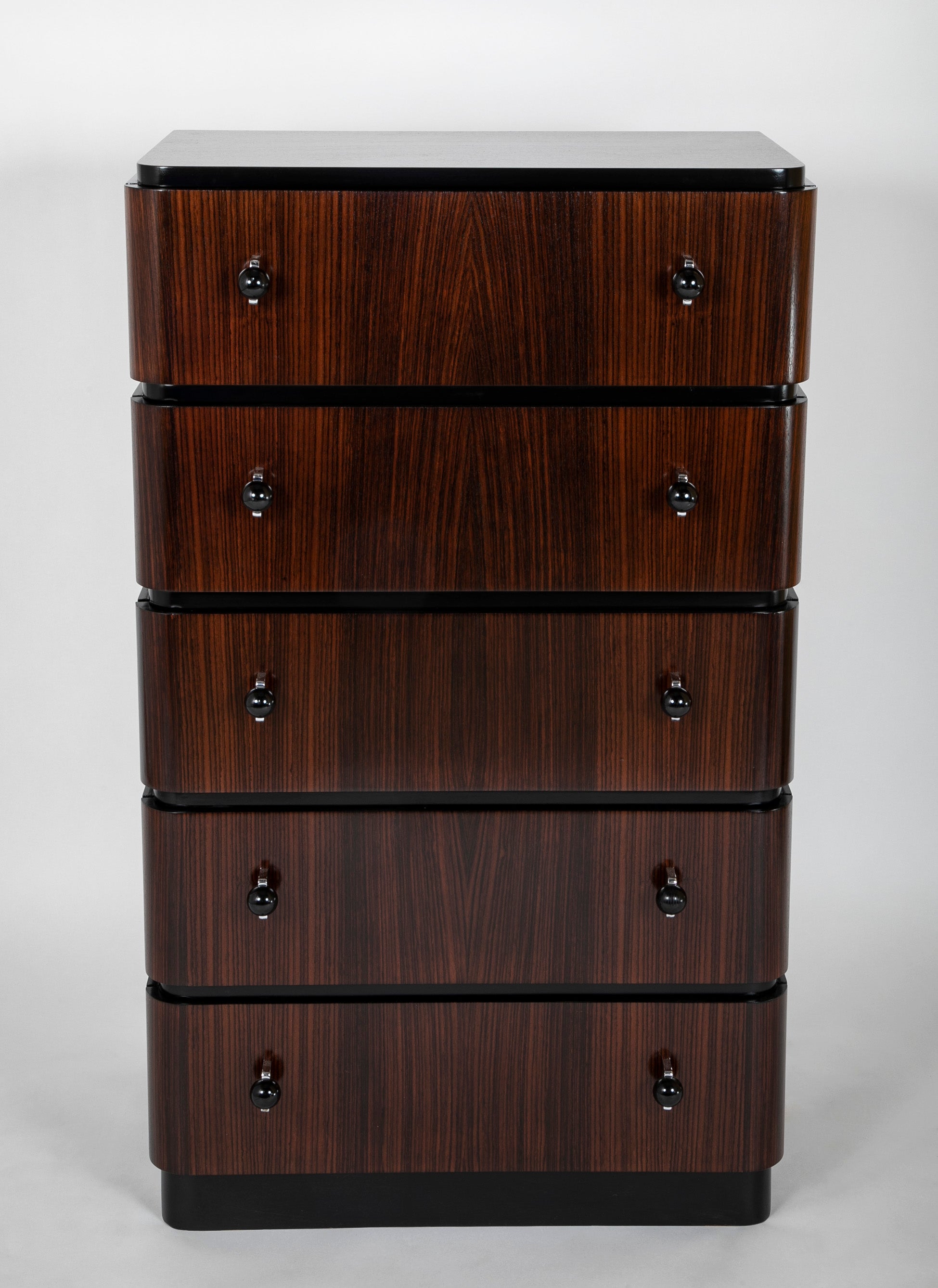 A Striking Pair of Indian Rosewood Chests of Drawers by Donald Deskey