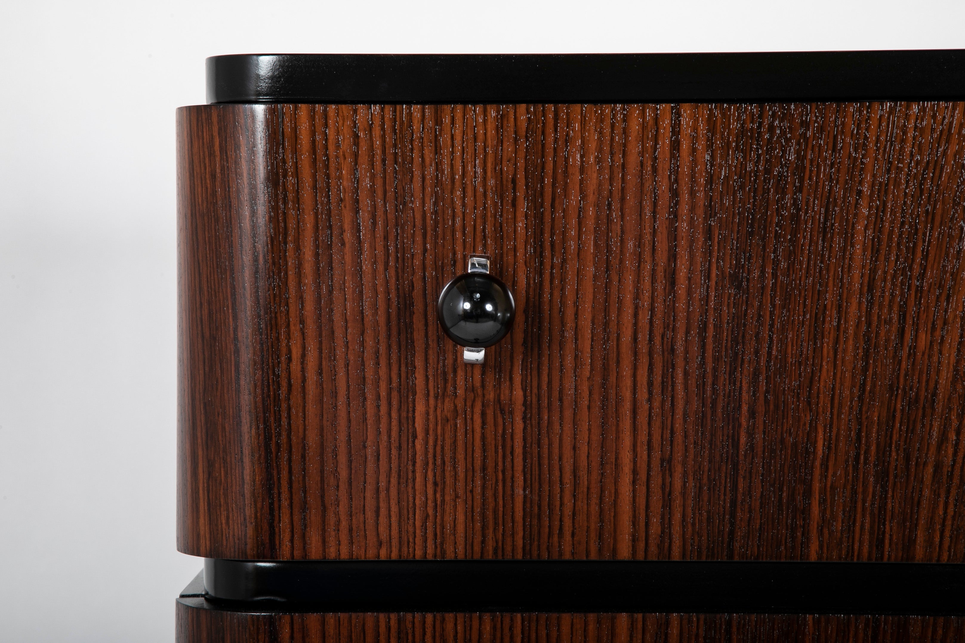 A Striking Pair of Indian Rosewood Chests of Drawers by Donald Deskey