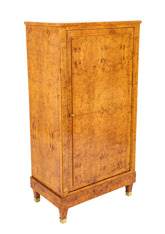 A French Burlwood Cabinet on Bronze Sabots