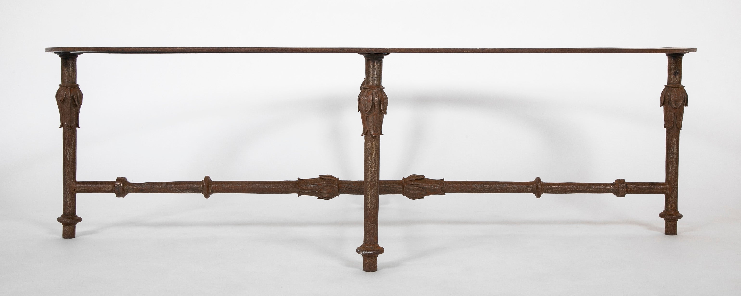 A Mid-Century Iron and Glass Oval Coffee Table