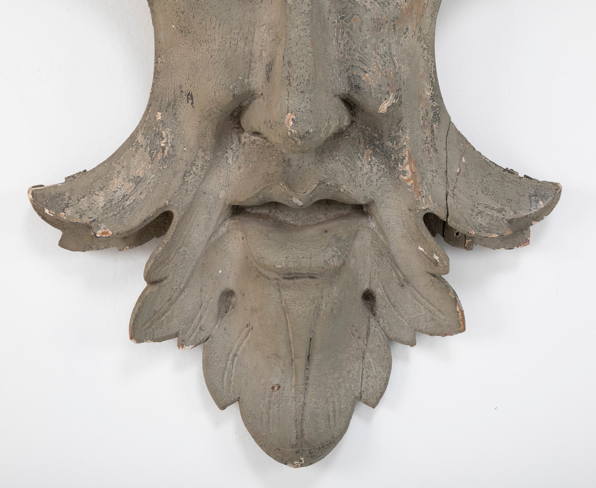 Carved and Painted Wood Architectural Element in the Form of a Mask