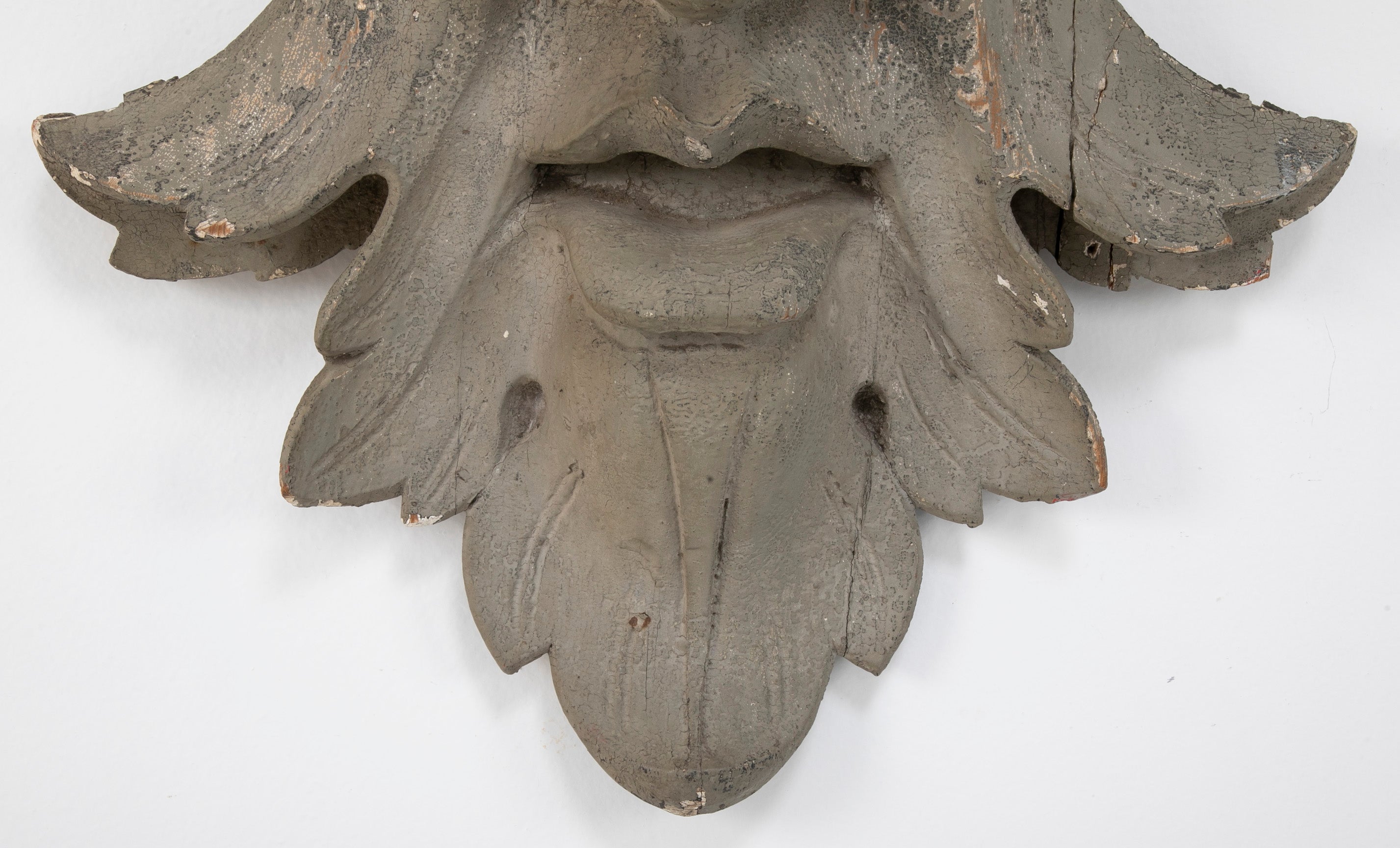 Carved and Painted Wood Architectural Element in the Form of a Mask