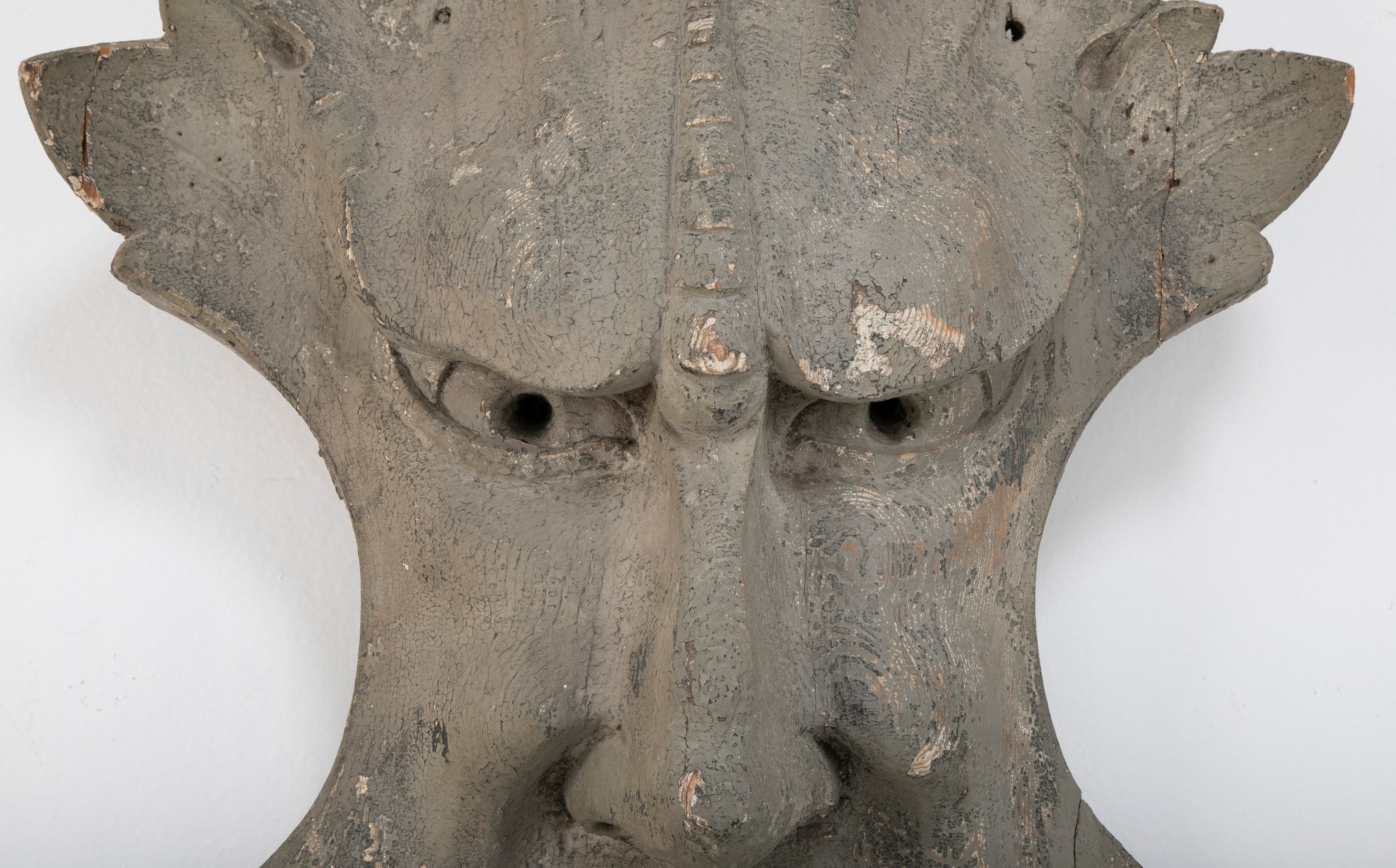 Carved and Painted Wood Architectural Element in the Form of a Mask