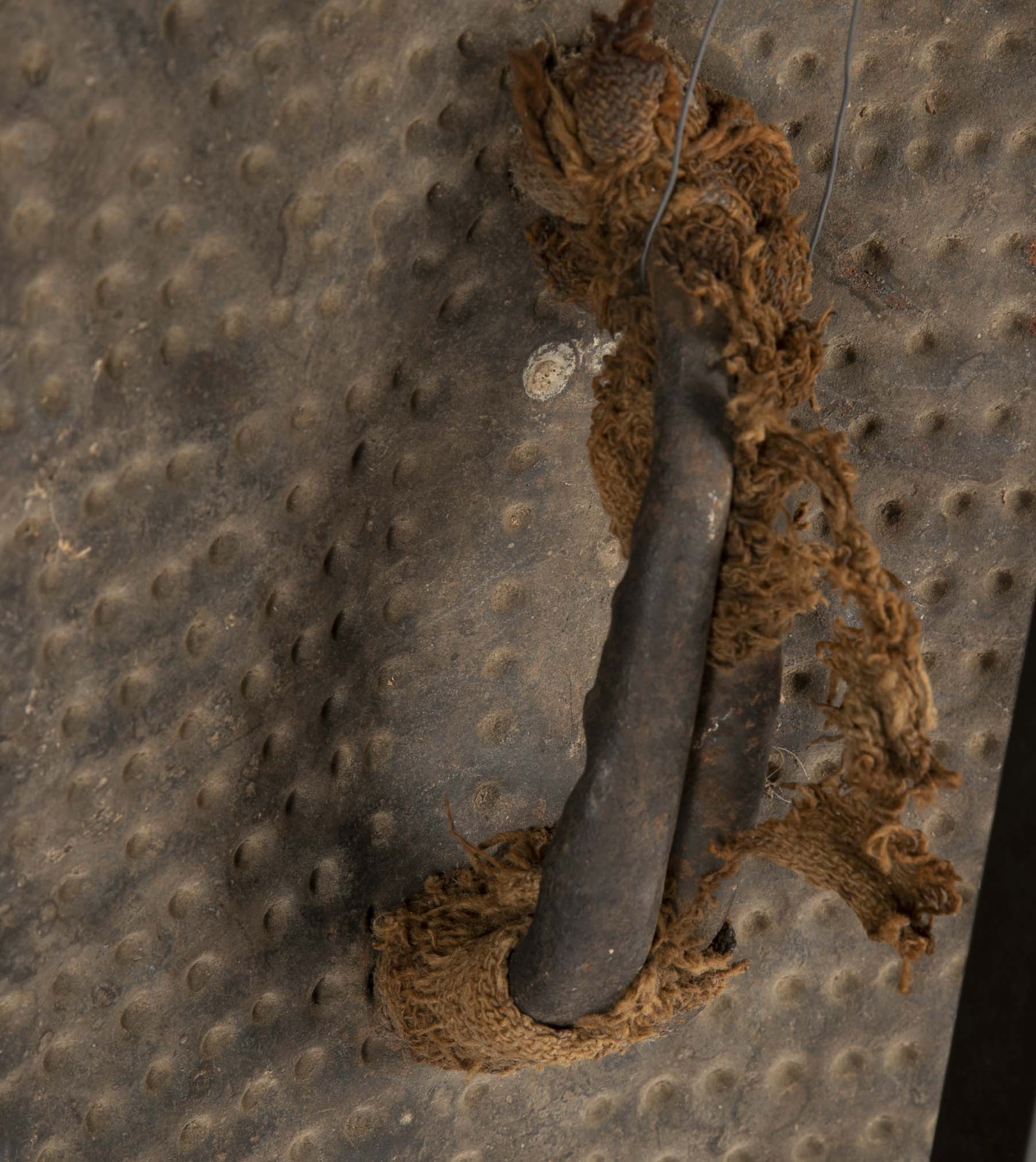 Embossed Metal Kirdi Shield from Cameroon on Bronze Stand