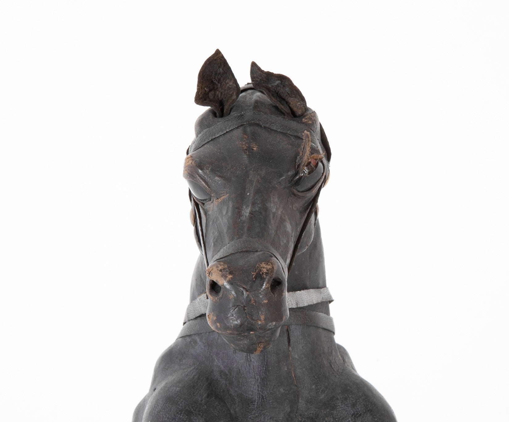 An Argentine Leather Clad Wood Horse