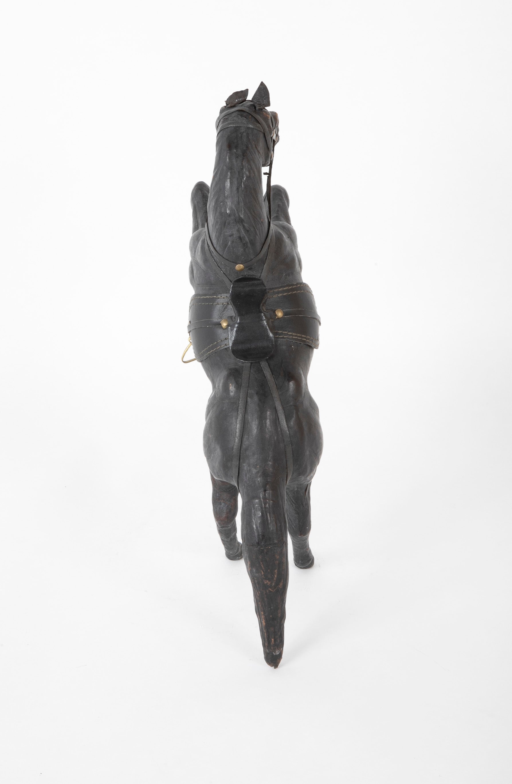 An Argentine Leather Clad Wood Horse