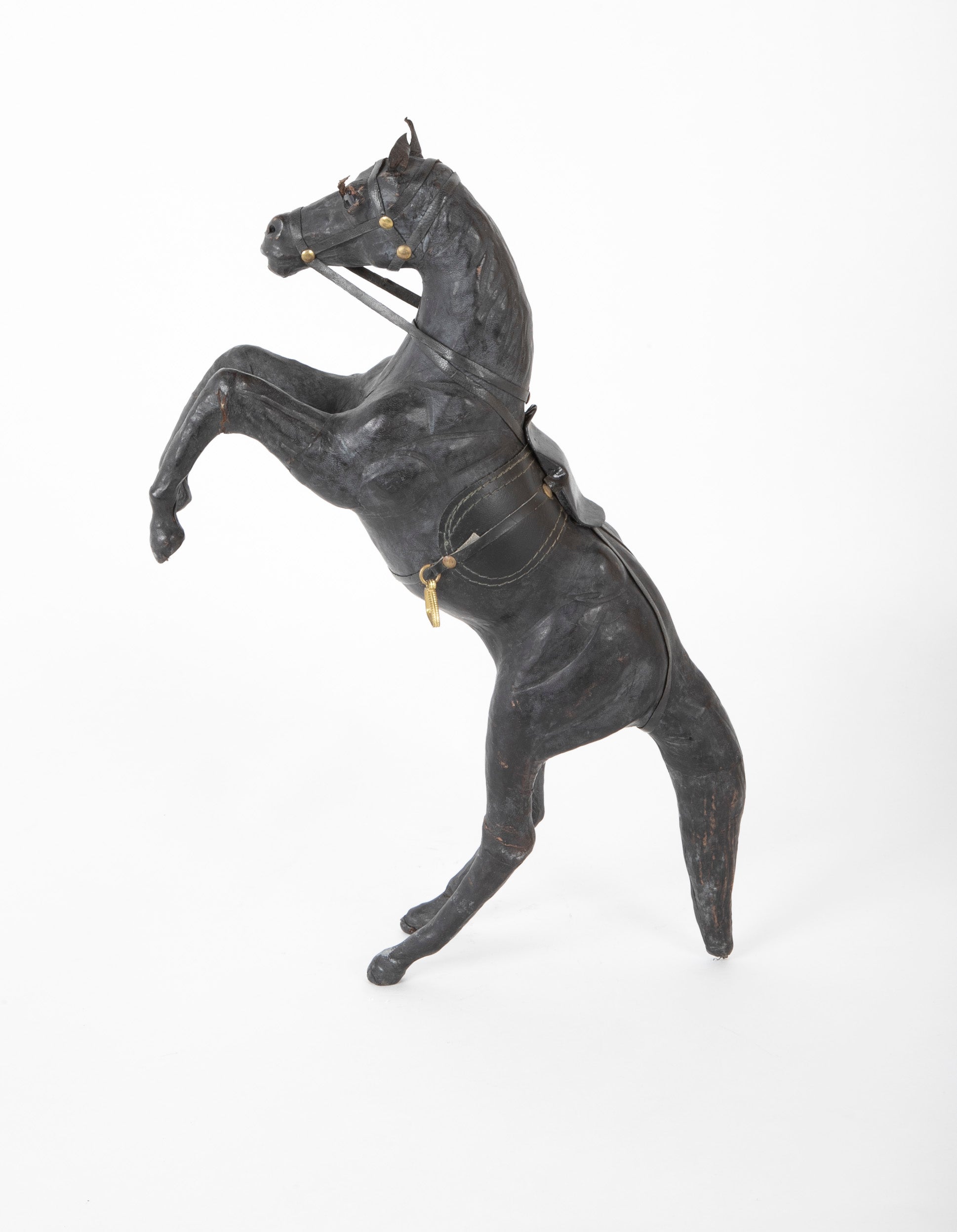 An Argentine Leather Clad Wood Horse