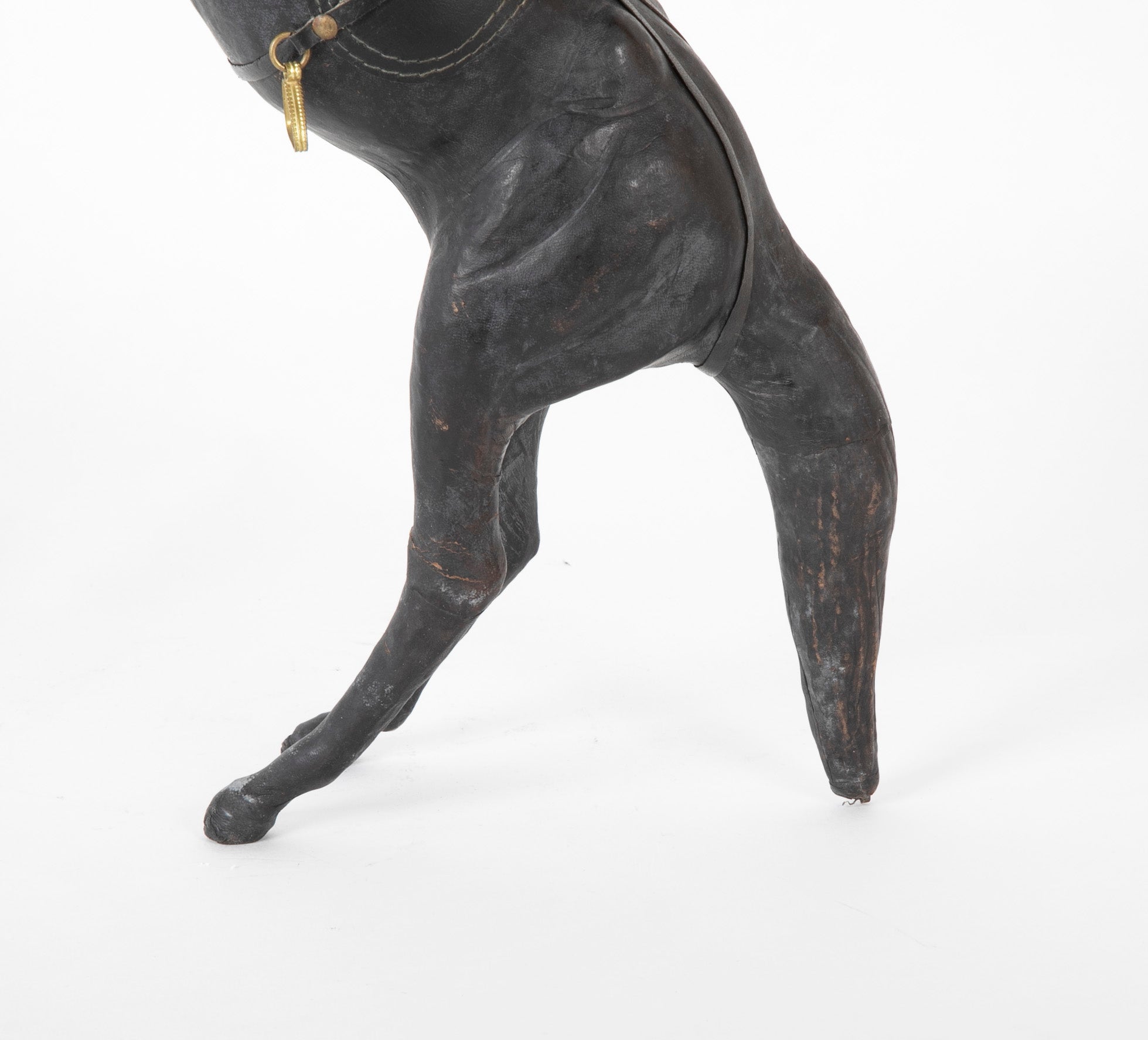 An Argentine Leather Clad Wood Horse