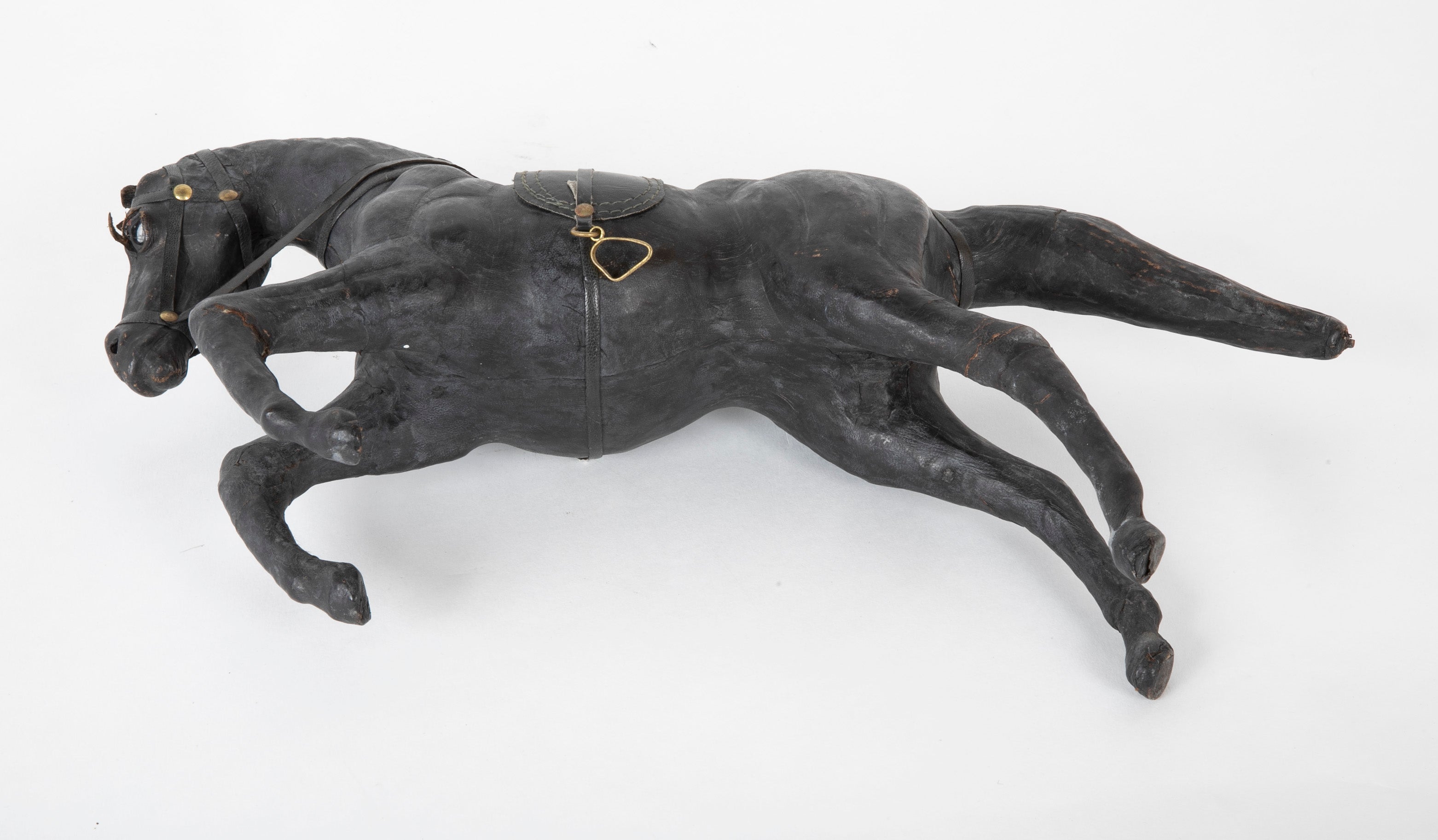 An Argentine Leather Clad Wood Horse