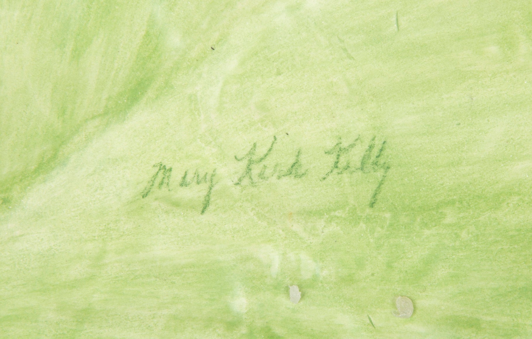 A Pair of Mary Kirk Kelly Porcelain Plates in Leaf Form