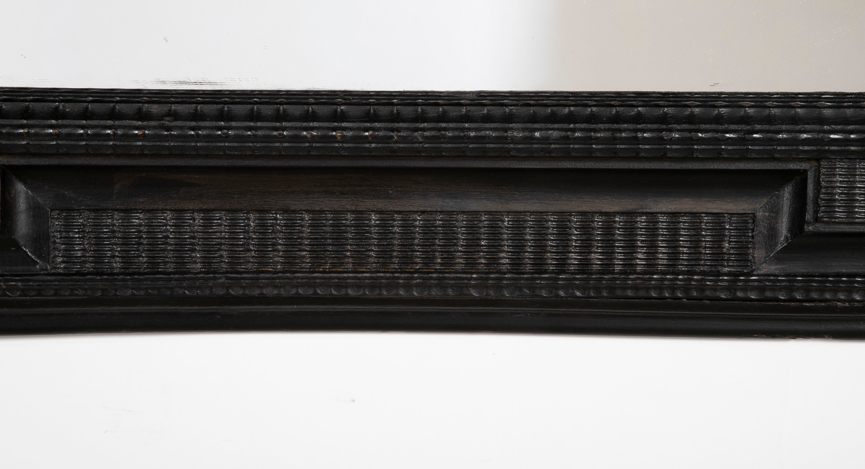 An Ebonized Dutch Baroque Style Mirror