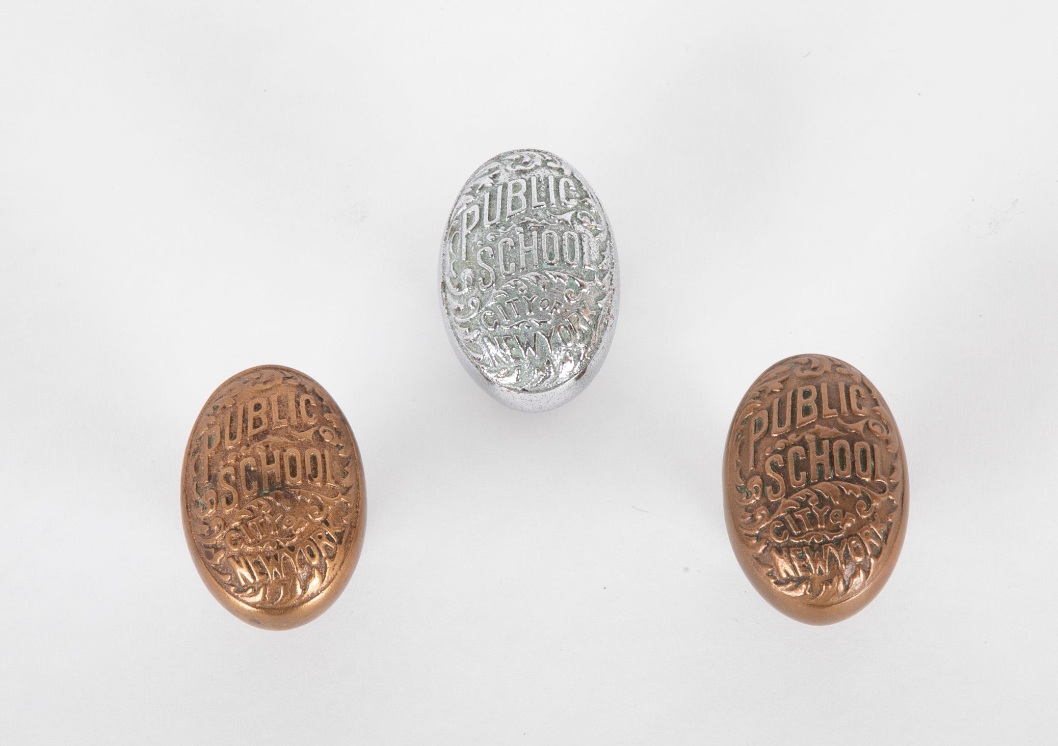 Set of Three New York City Public School Brass Door Knobs