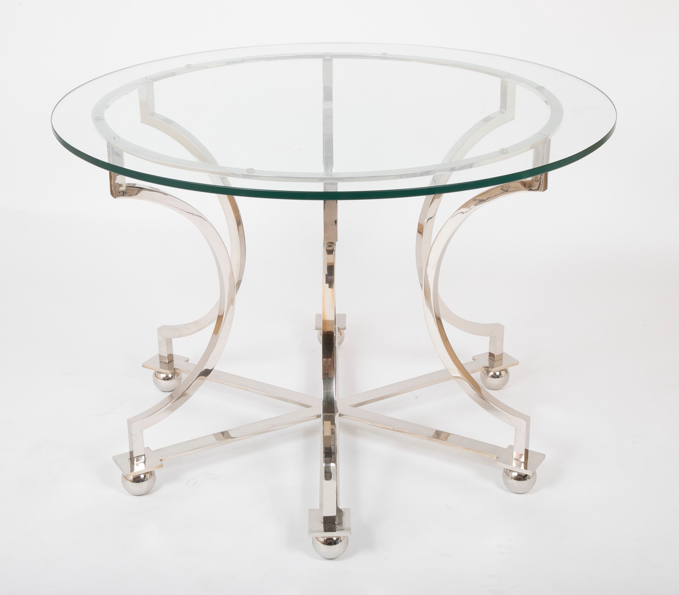 Highly Polished Silver Metal Base Glass Top Table