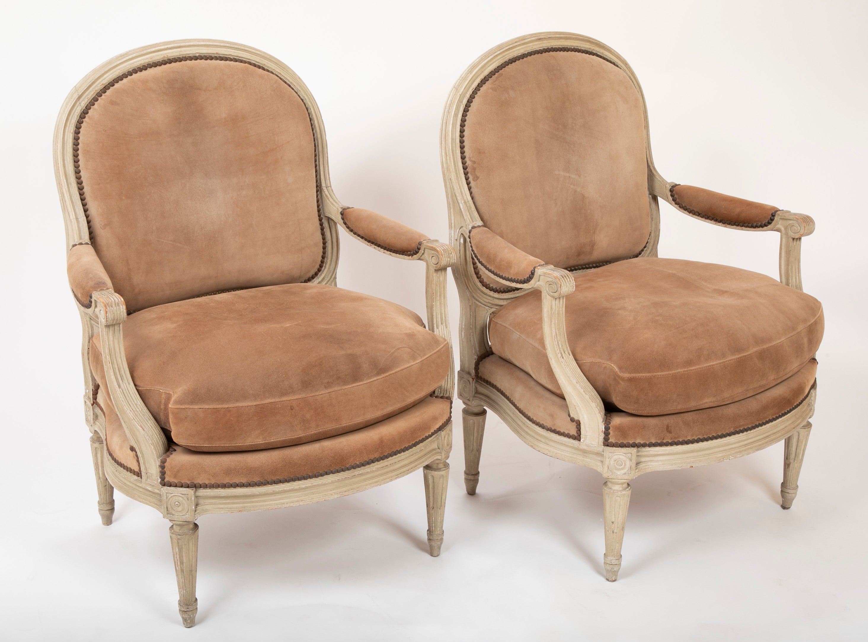 A Pair of Louis XVI Style Suede and Painted Armchairs by Maison Jansen