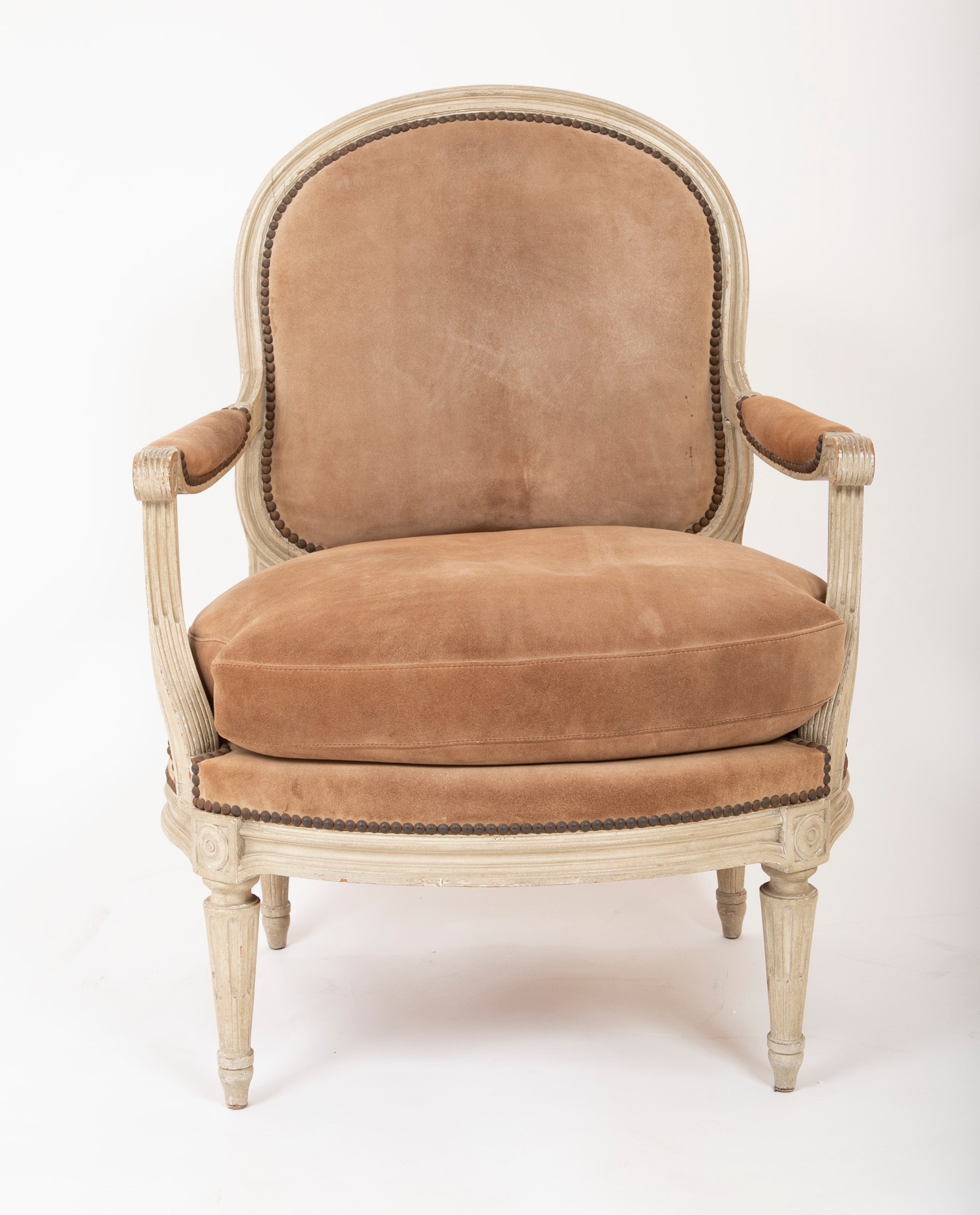 A Pair of Louis XVI Style Suede and Painted Armchairs by Maison Jansen