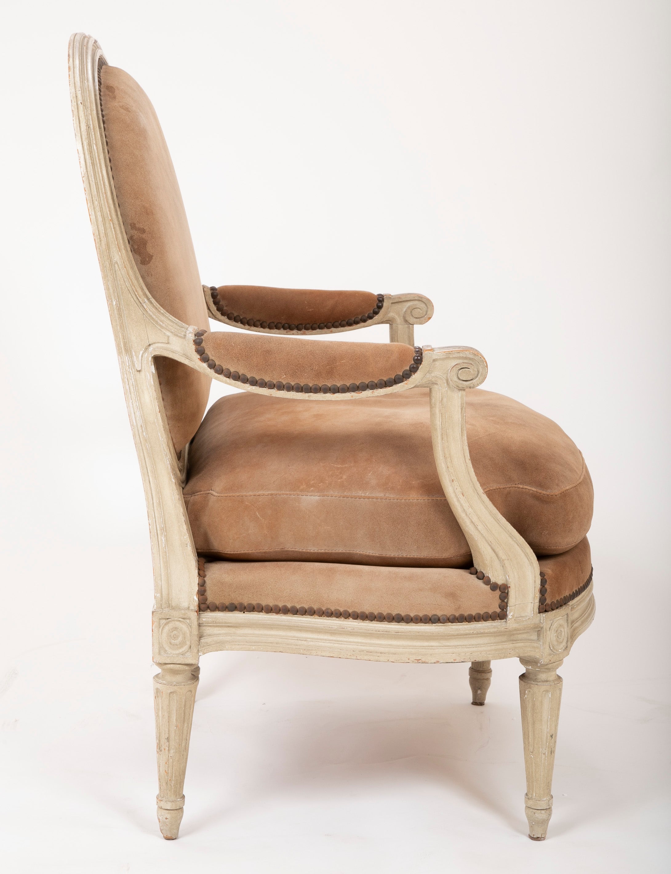 A Pair of Louis XVI Style Suede and Painted Armchairs by Maison Jansen