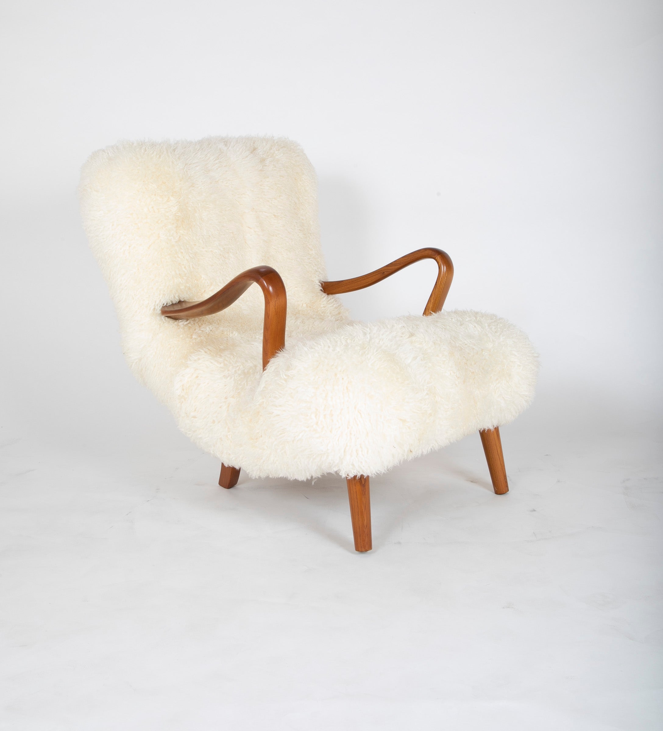 Mid-Century Danish Chair of Elm Wood and Sheepskin in the Style of Arctander