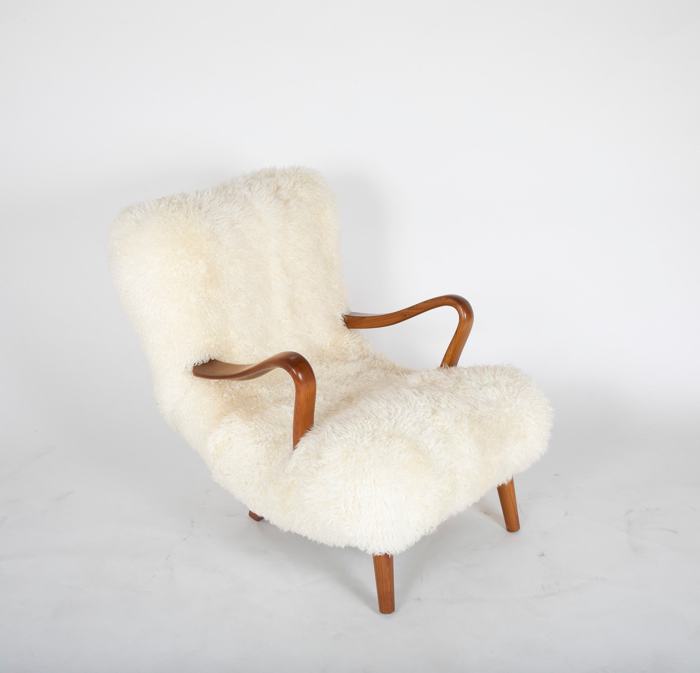 Mid-Century Danish Chair of Elm Wood and Sheepskin in the Style of Arctander
