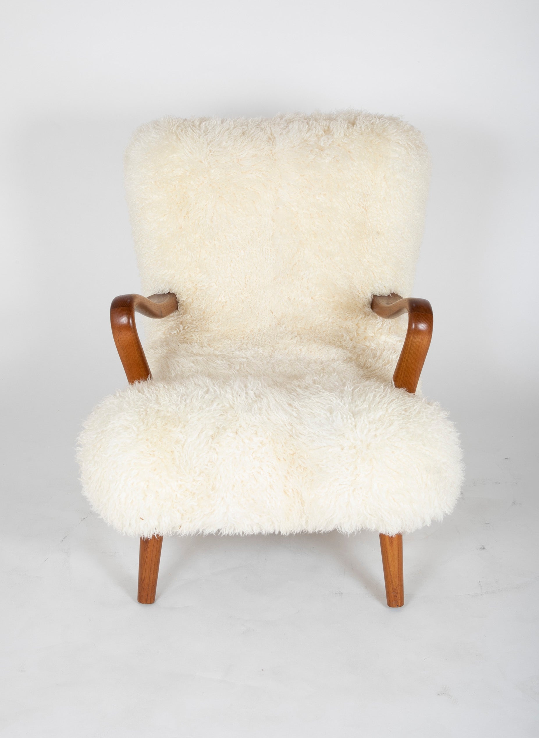 Mid-Century Danish Chair of Elm Wood and Sheepskin in the Style of Arctander