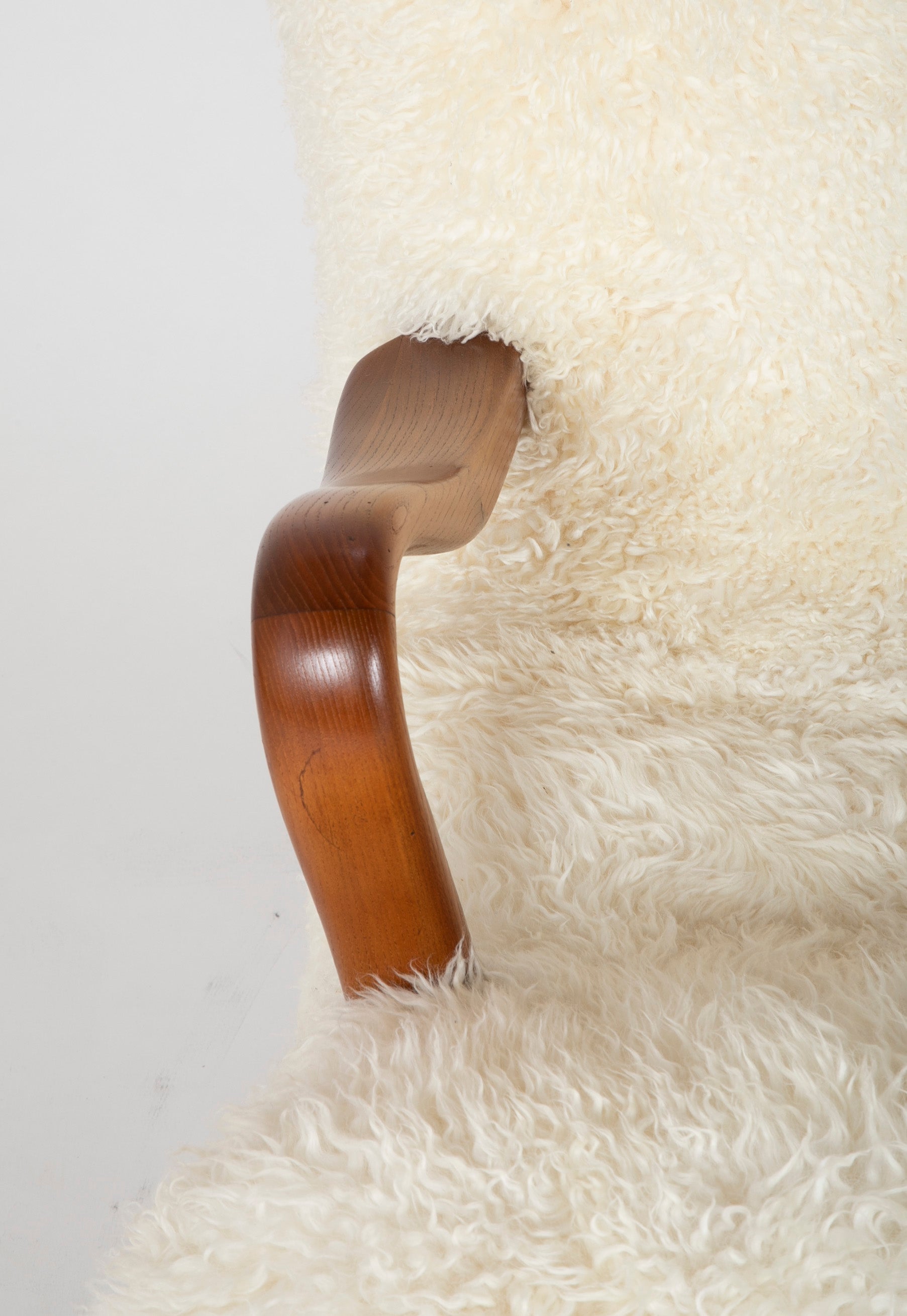 Mid-Century Danish Chair of Elm Wood and Sheepskin in the Style of Arctander