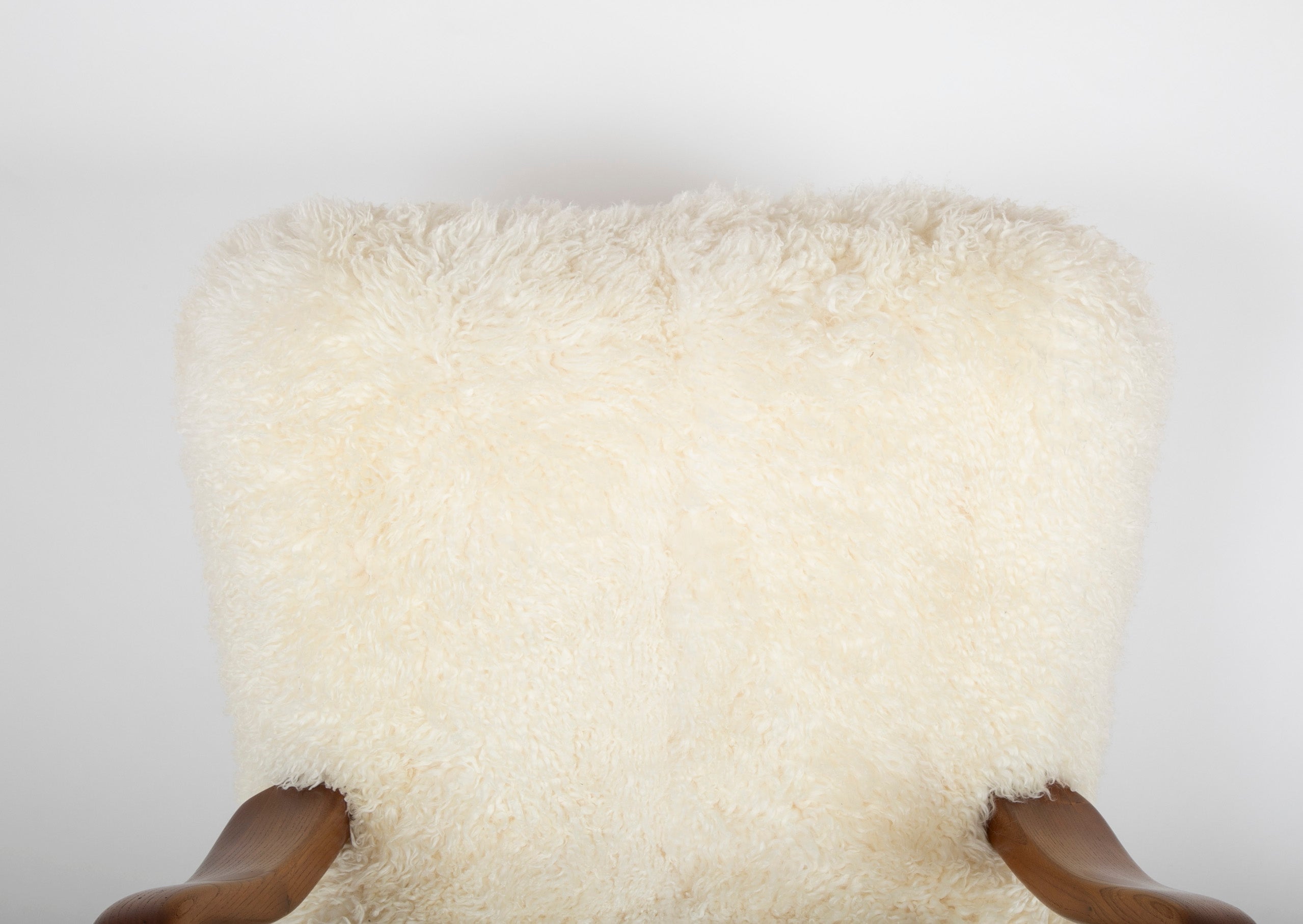 Mid-Century Danish Chair of Elm Wood and Sheepskin in the Style of Arctander