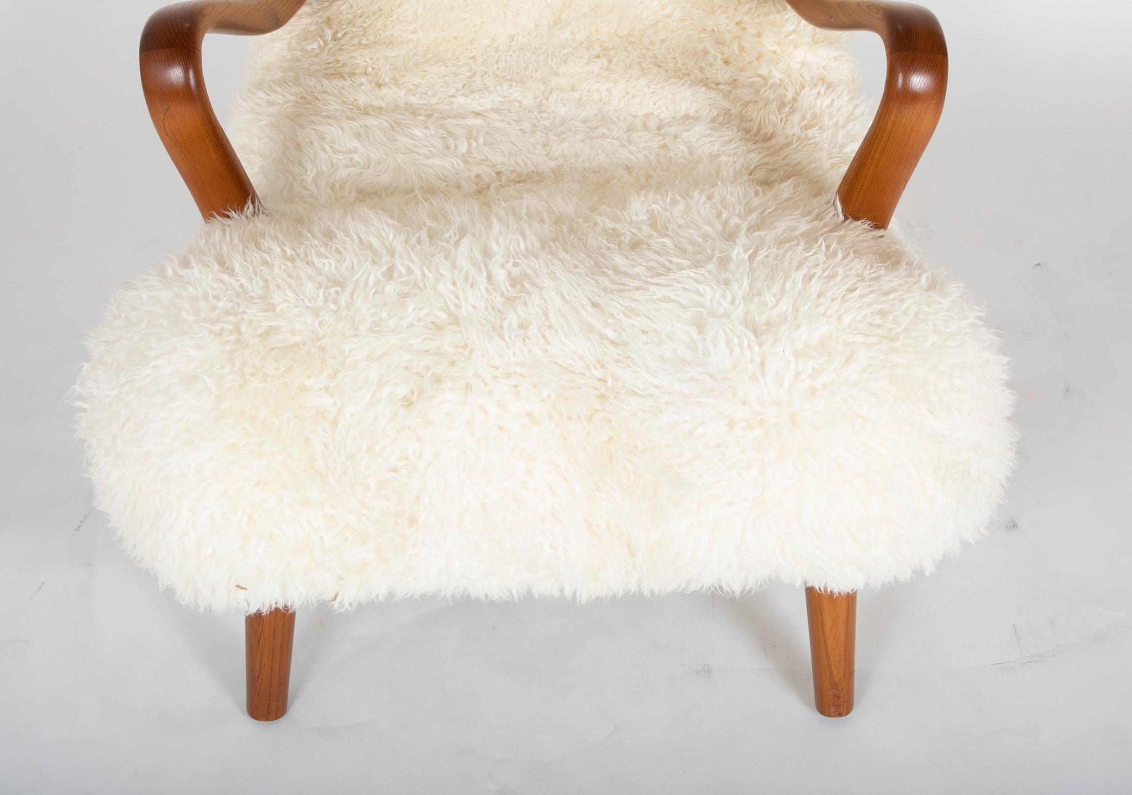Mid-Century Danish Chair of Elm Wood and Sheepskin in the Style of Arctander
