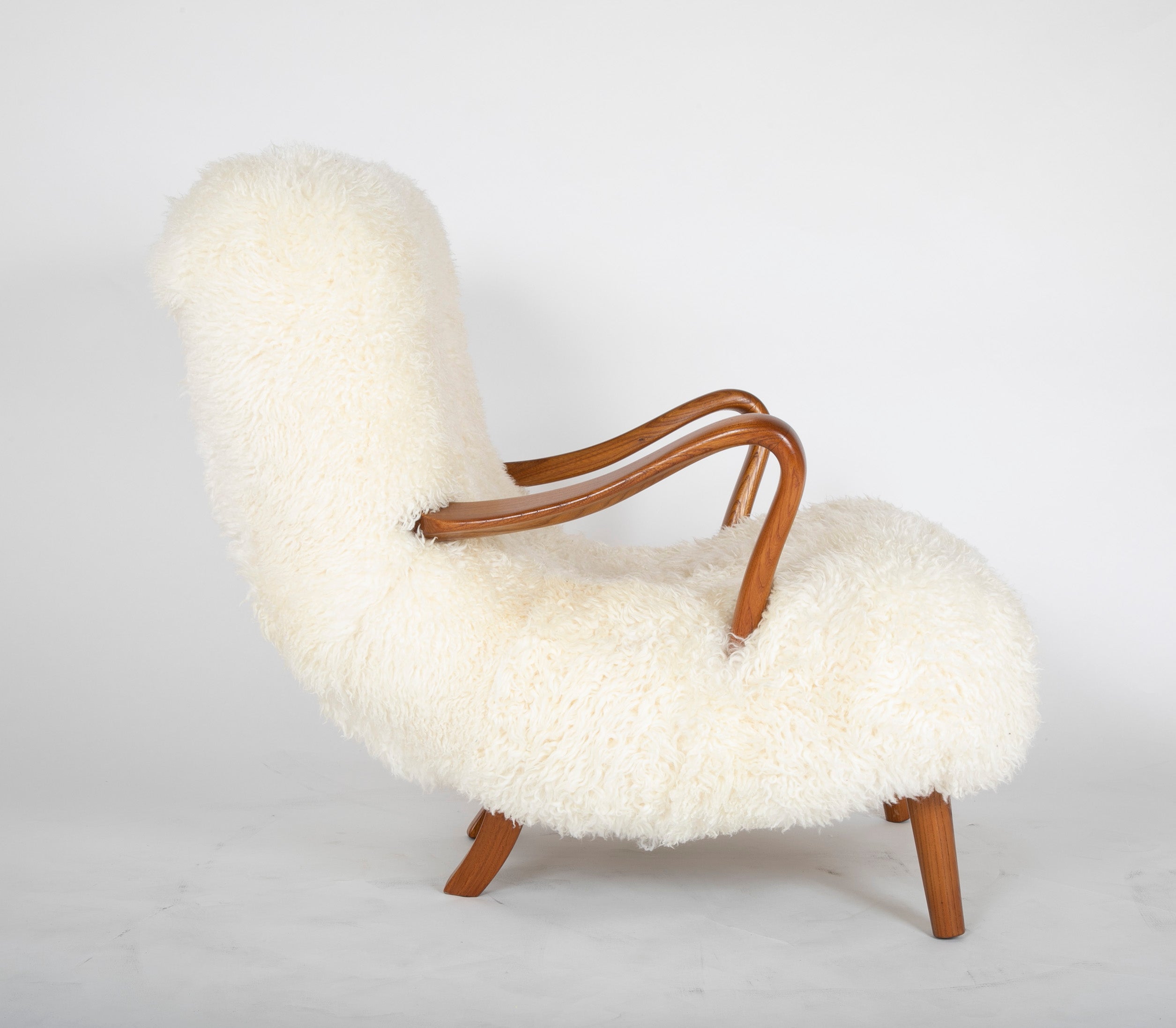 Mid-Century Danish Chair of Elm Wood and Sheepskin in the Style of Arctander