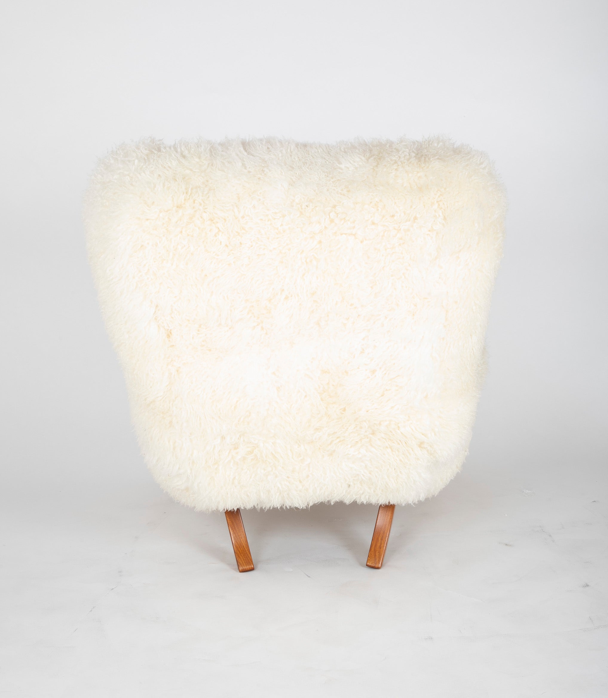Mid-Century Danish Chair of Elm Wood and Sheepskin in the Style of Arctander