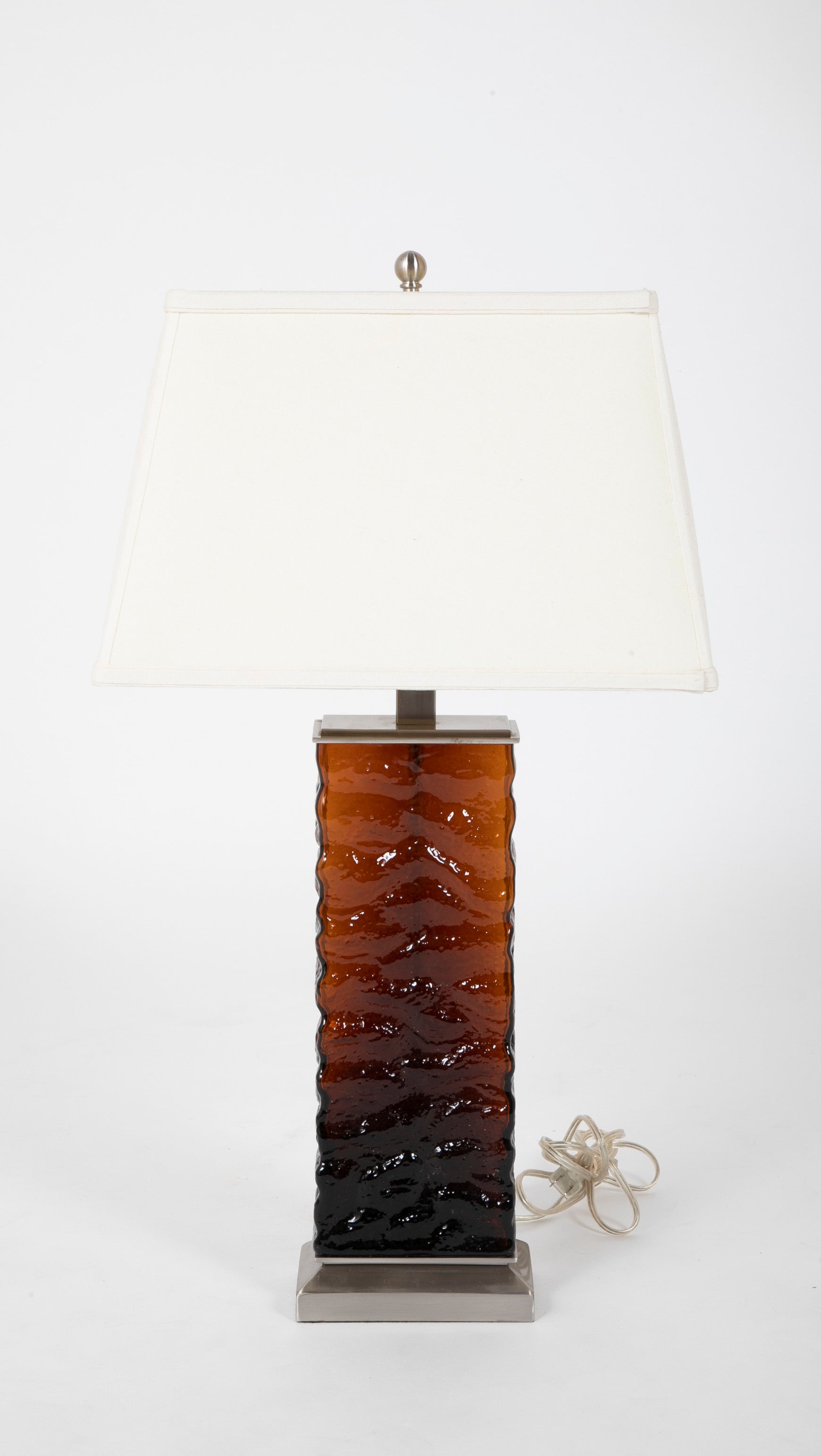 A Pair of Mid-Century Wavy Amber Glass & Steel Lamps