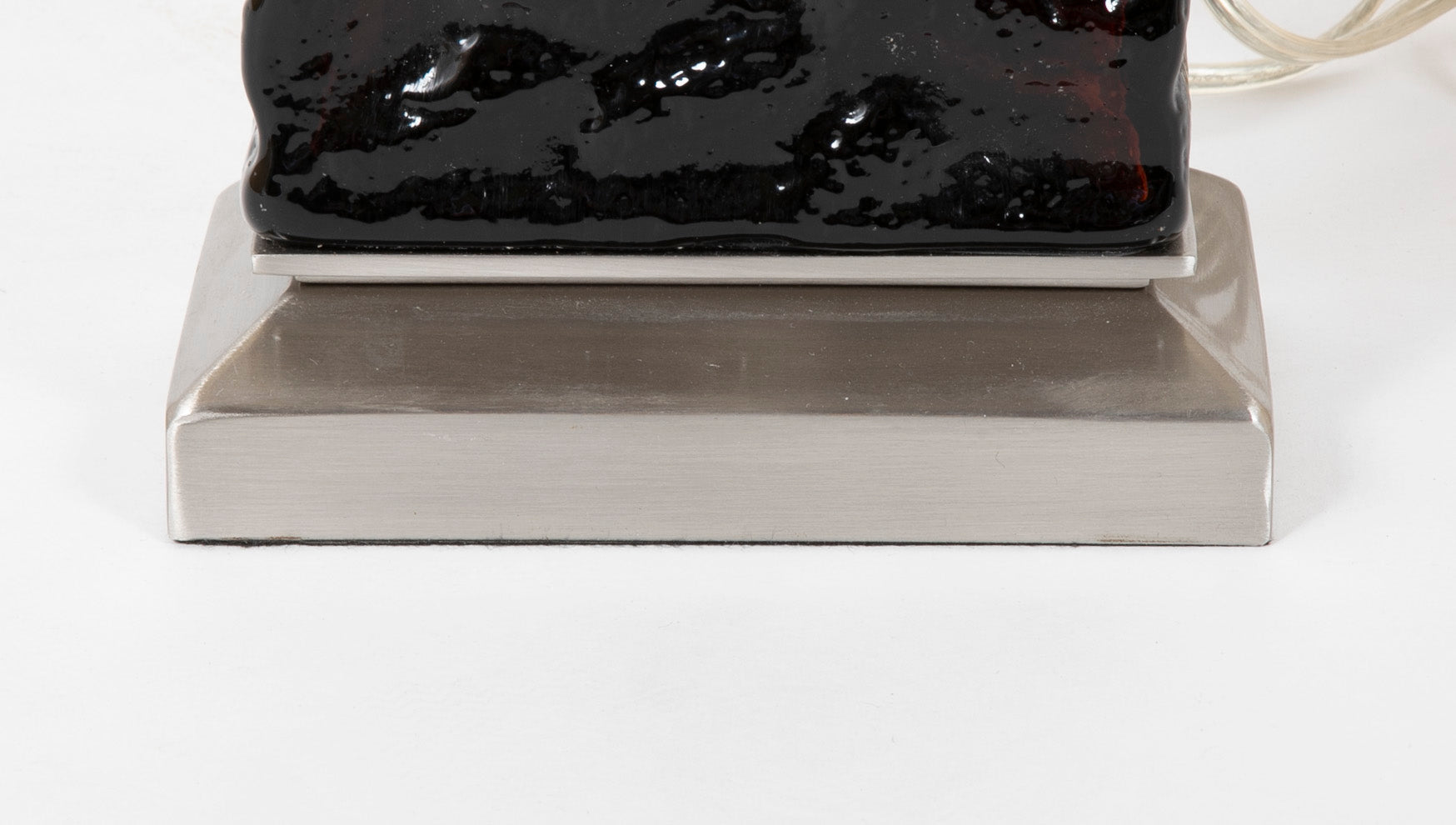 A Pair of Mid-Century Wavy Amber Glass & Steel Lamps