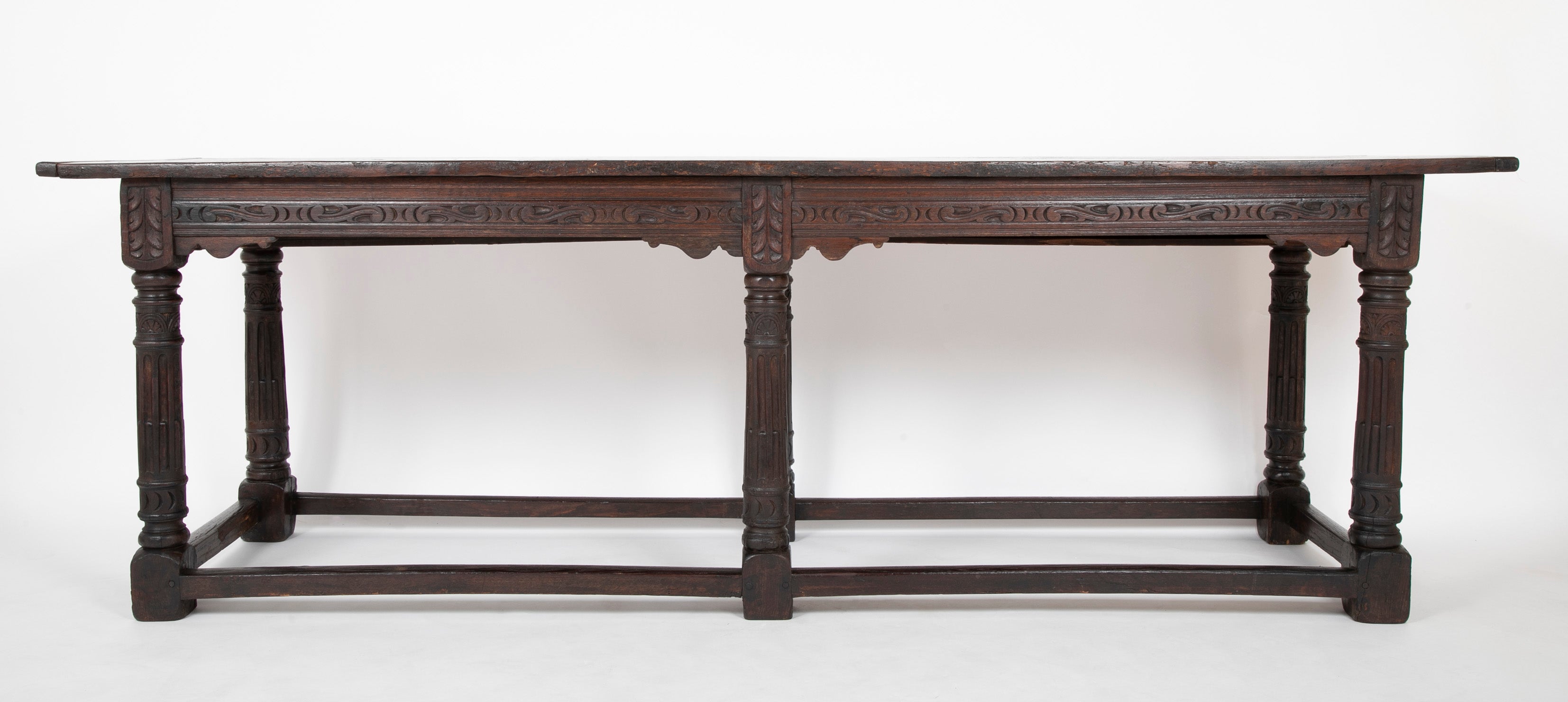 An 18th Century English Oak Refectory Table with Carved Apron