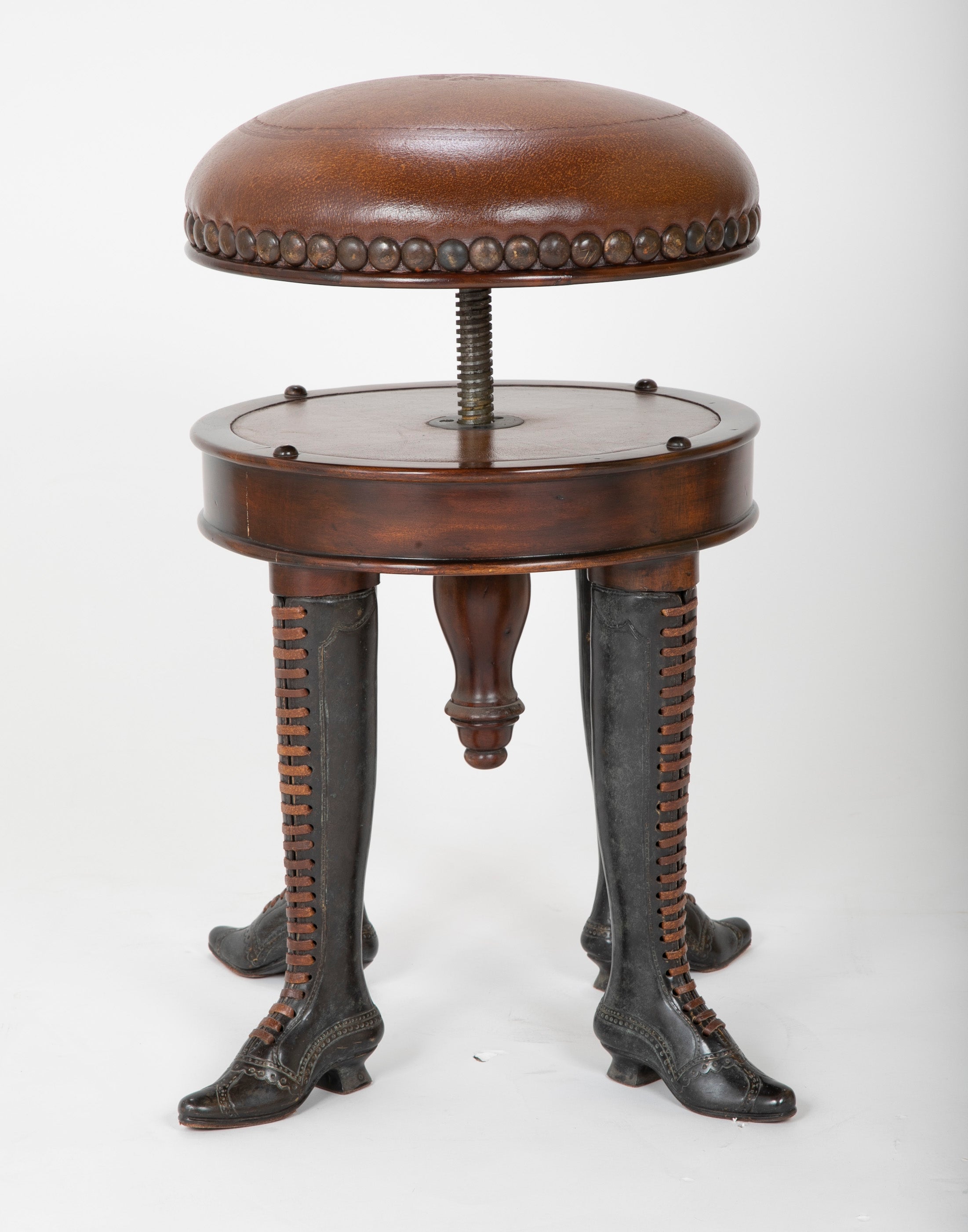Bronze Four Legged Adjustable Revolving Stool with Leather Upholstered Seat