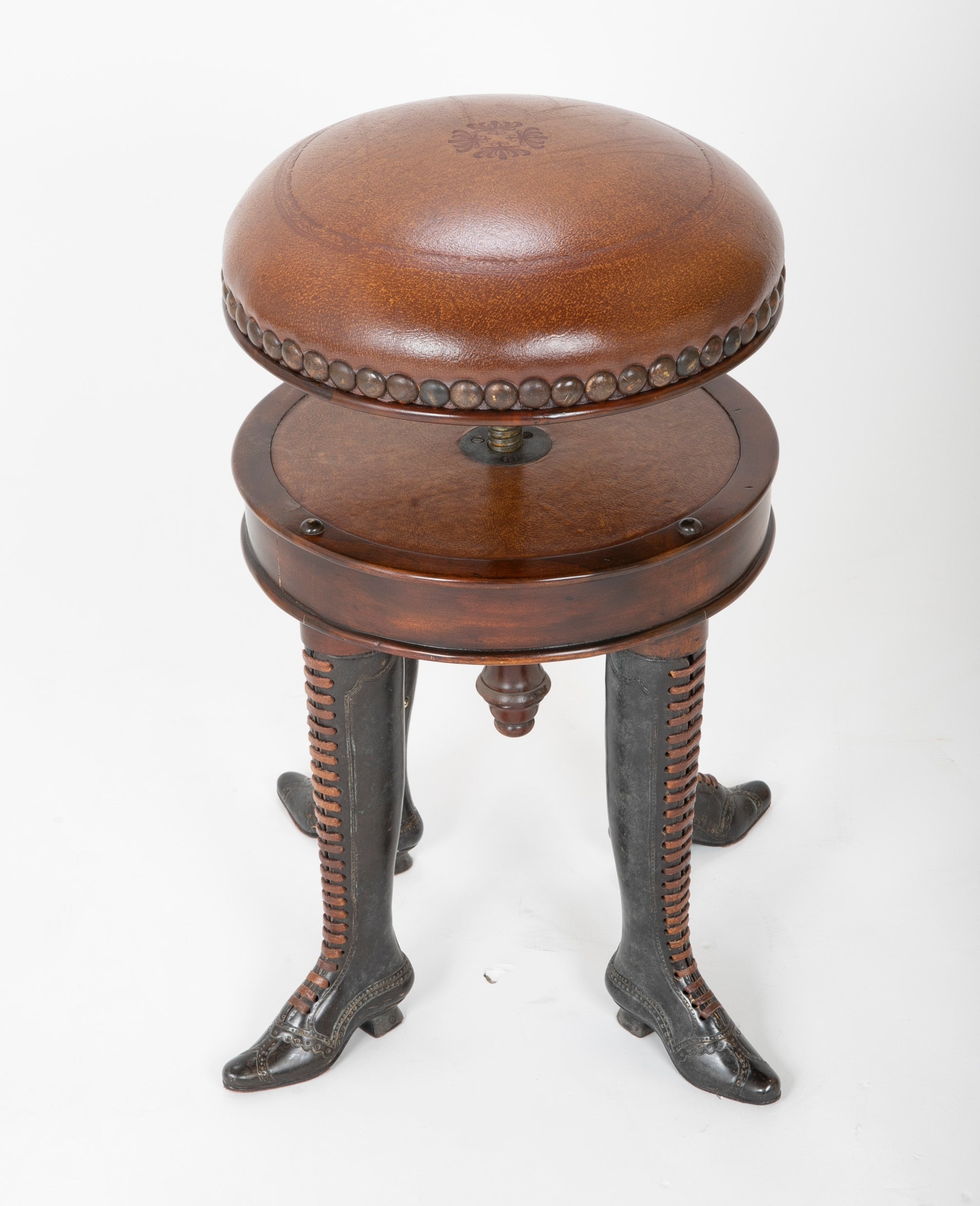 Bronze Four Legged Adjustable Revolving Stool with Leather Upholstered Seat