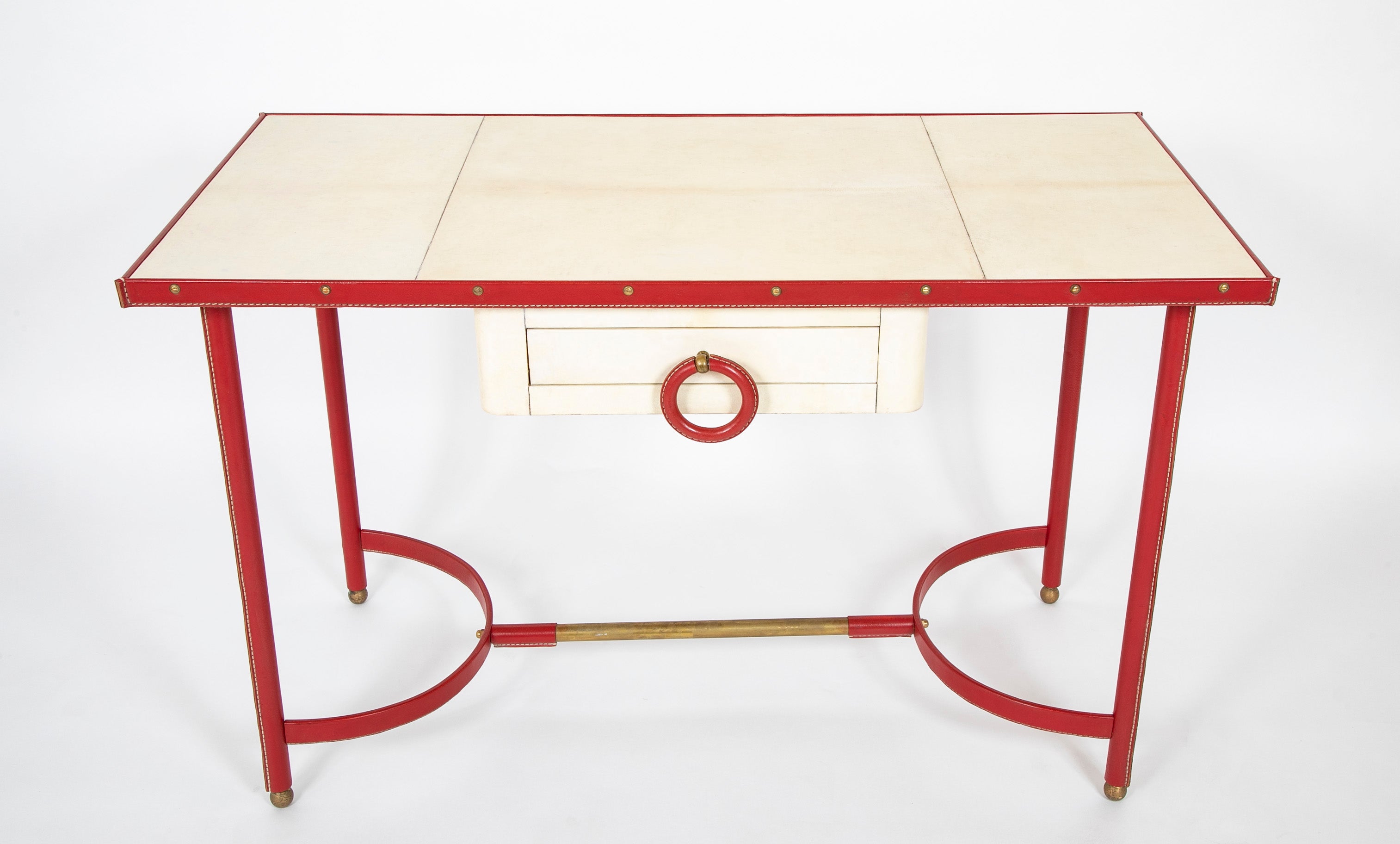 A Parchment and Leather Clad Desk by Jacques Adnet