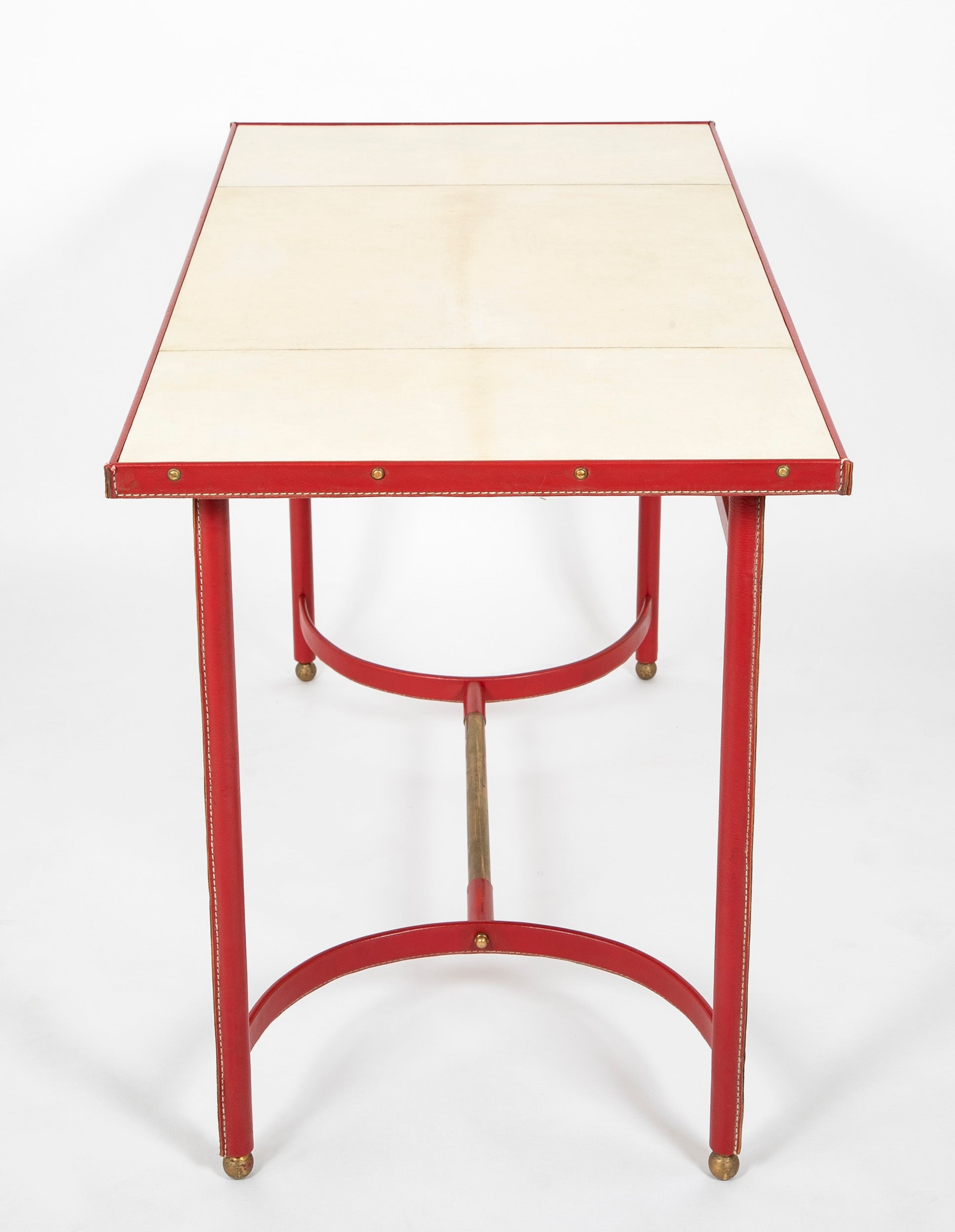 A Parchment and Leather Clad Desk by Jacques Adnet