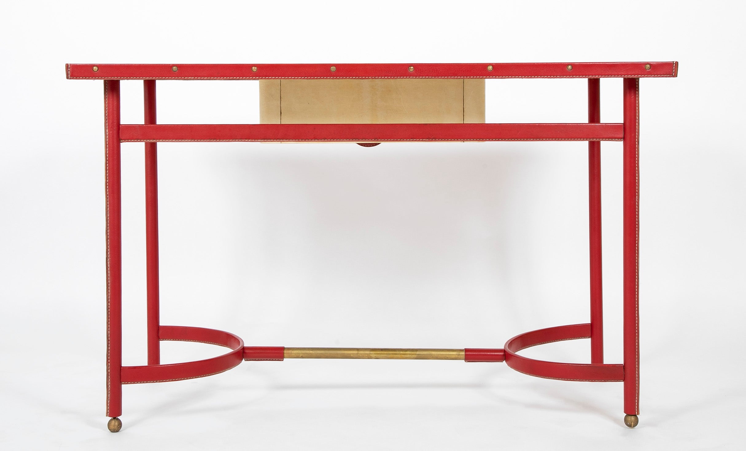 A Parchment and Leather Clad Desk by Jacques Adnet