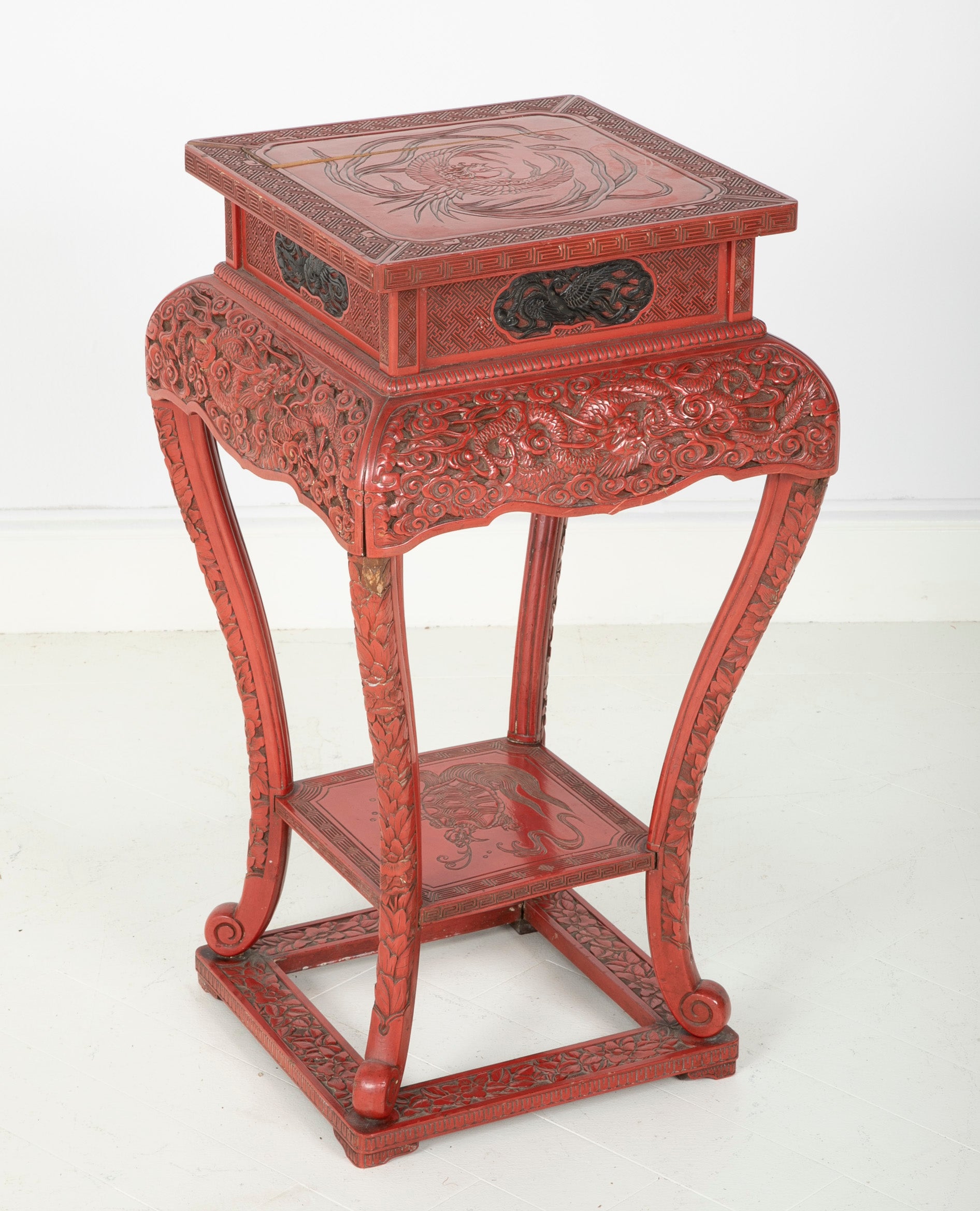A Cinnabar Lacquer Stand of Square Sectioned Form