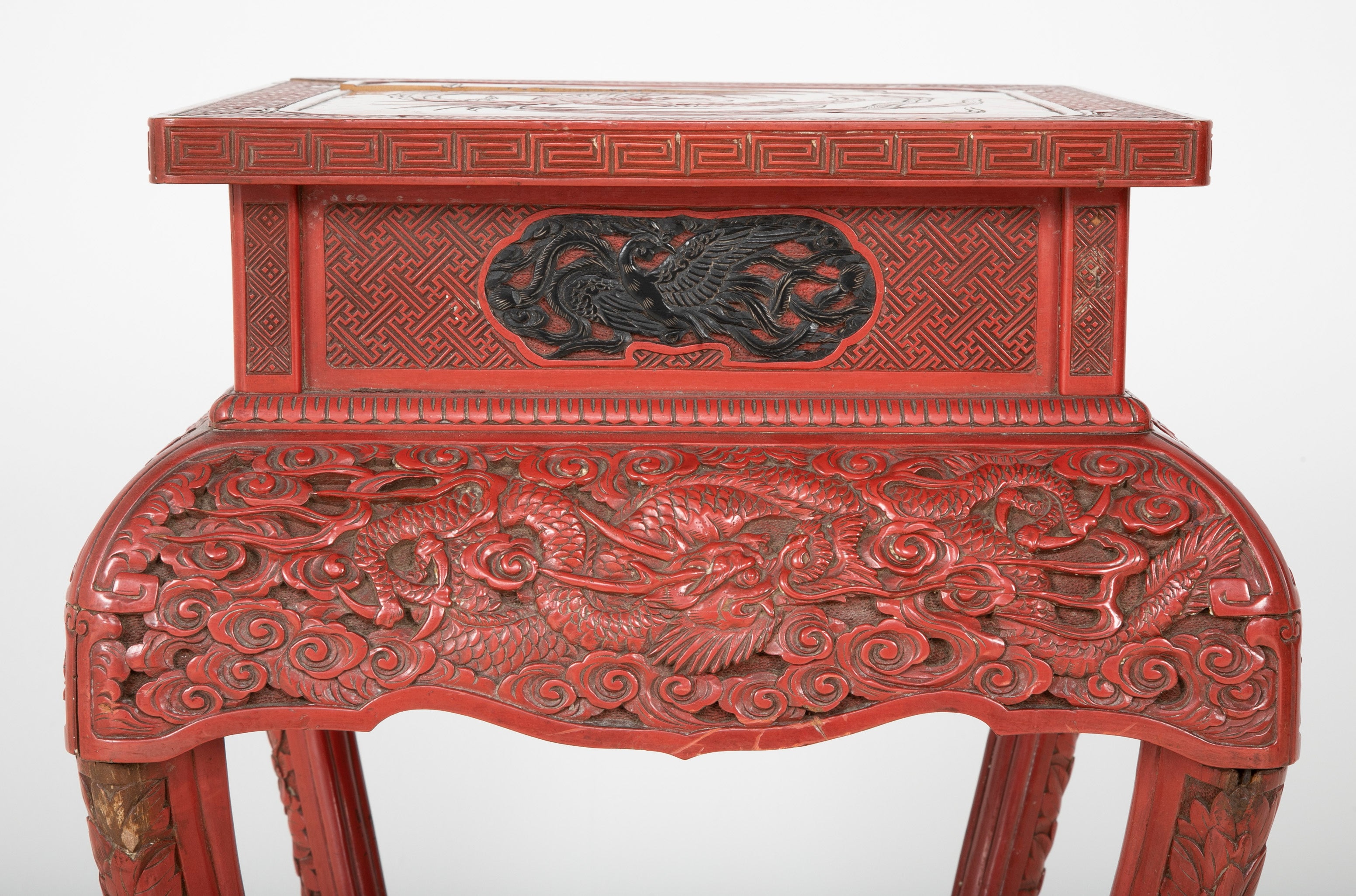 A Cinnabar Lacquer Stand of Square Sectioned Form