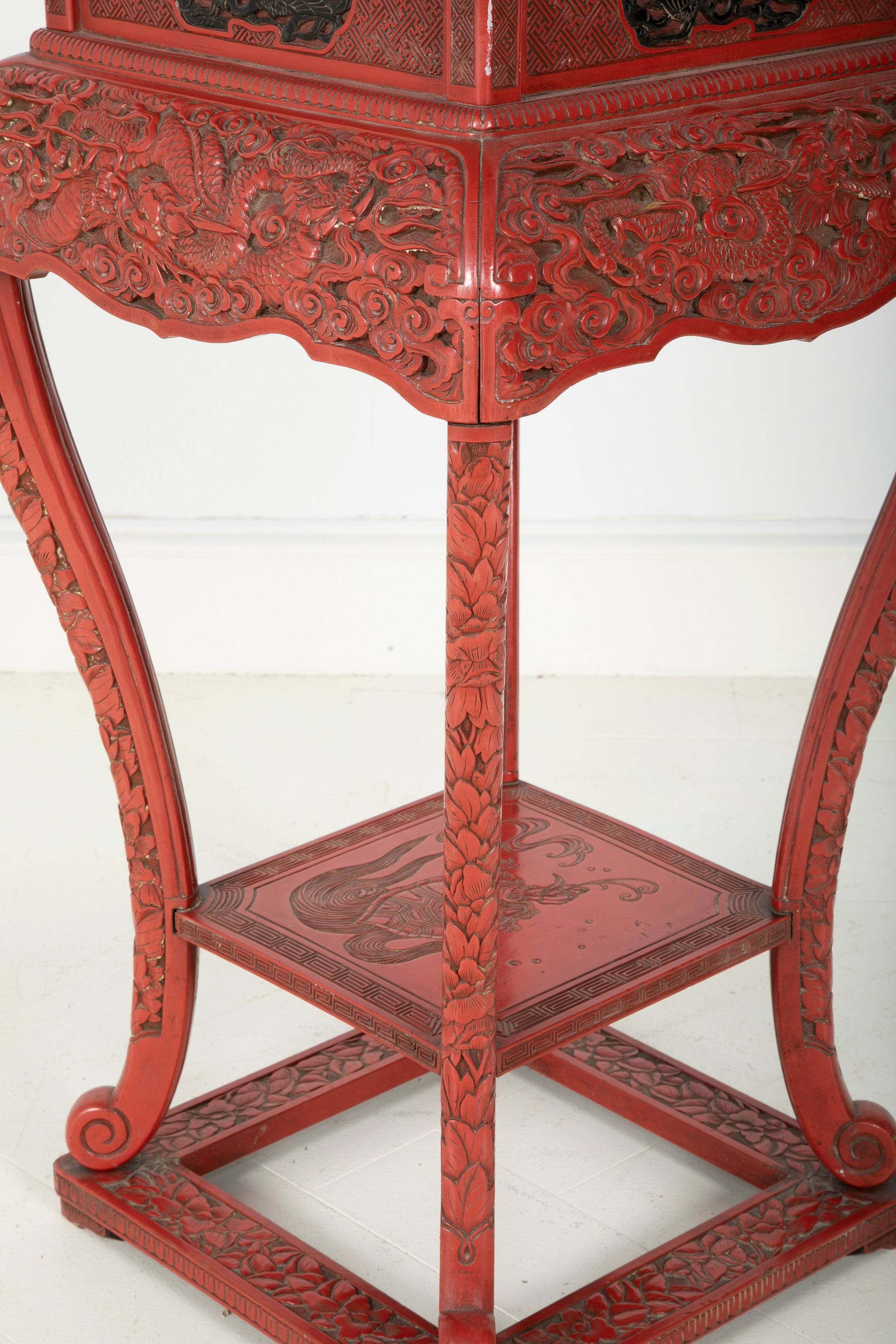 A Cinnabar Lacquer Stand of Square Sectioned Form