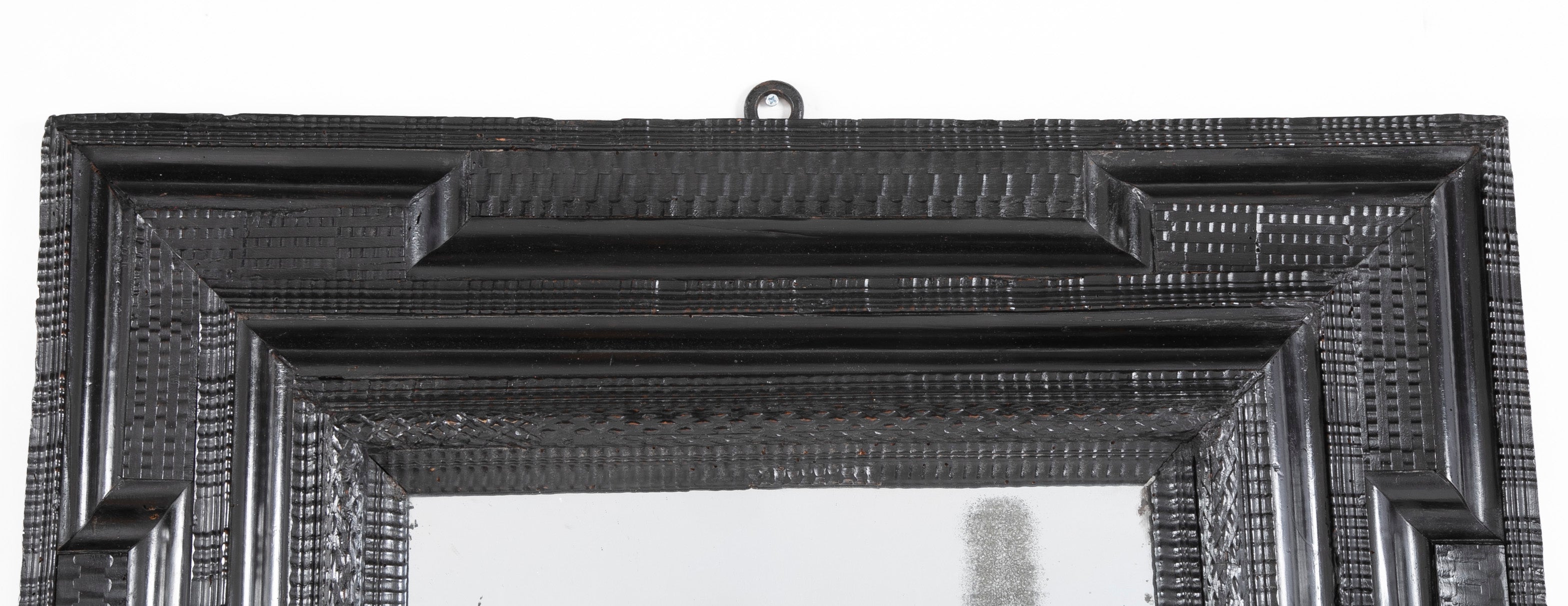An 18th Century Dutch Ripple Ebonized Framed Mirror